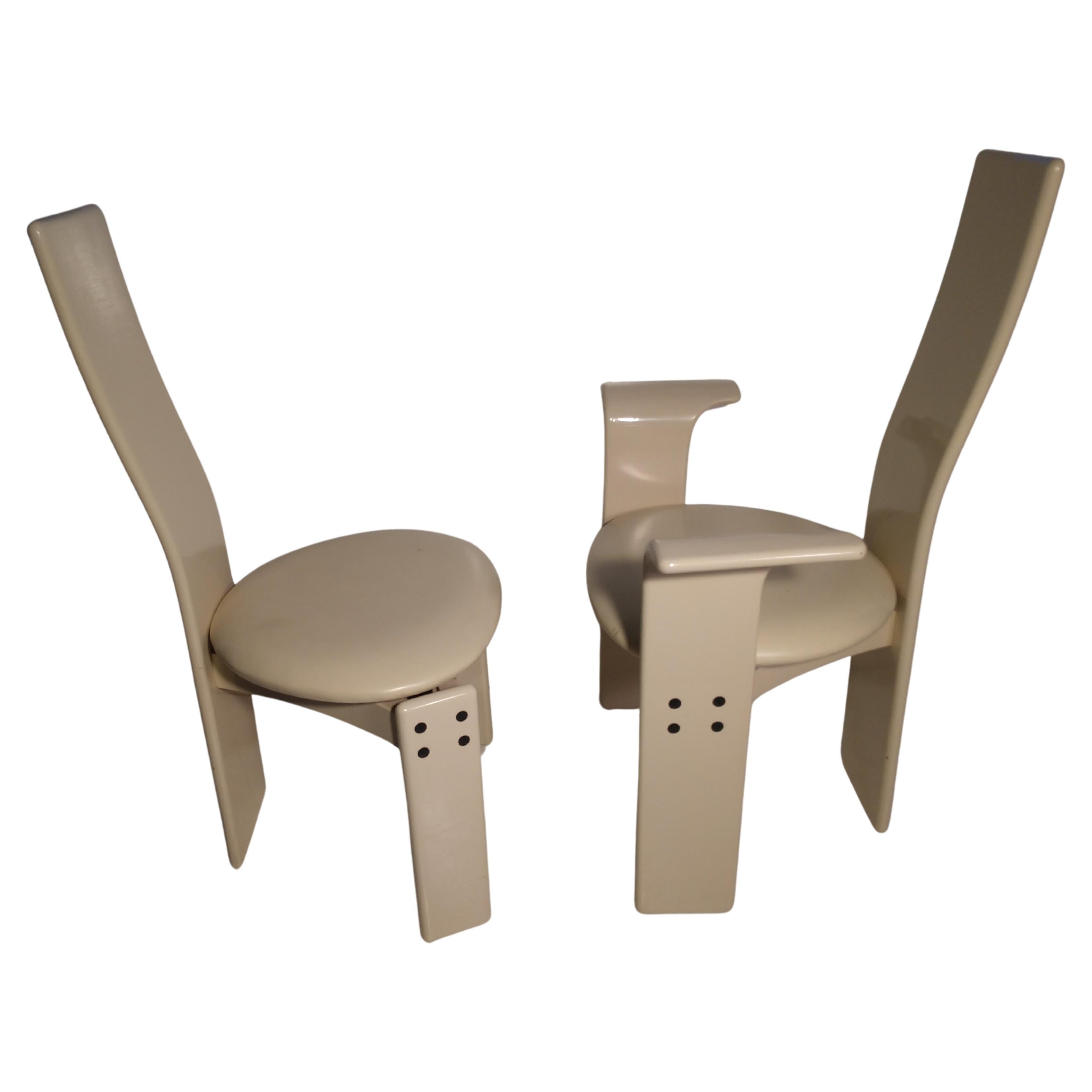 Set of 4 Postmodern lacquered white dining room chairs. Marked made in Italy, in the style of Saporiti. Minor blemishes to the lacquer is at a minimum.
Pictured. Size: Seat height is 18.