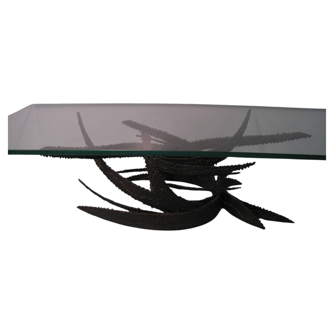 Beautiful abstract torch cut steel base with original 3/4 inch beveled glass top. Fabulous and large The piece that makes an impact on your living room. Well designed piece by the artist Daniel Gluck. Glass is perfect