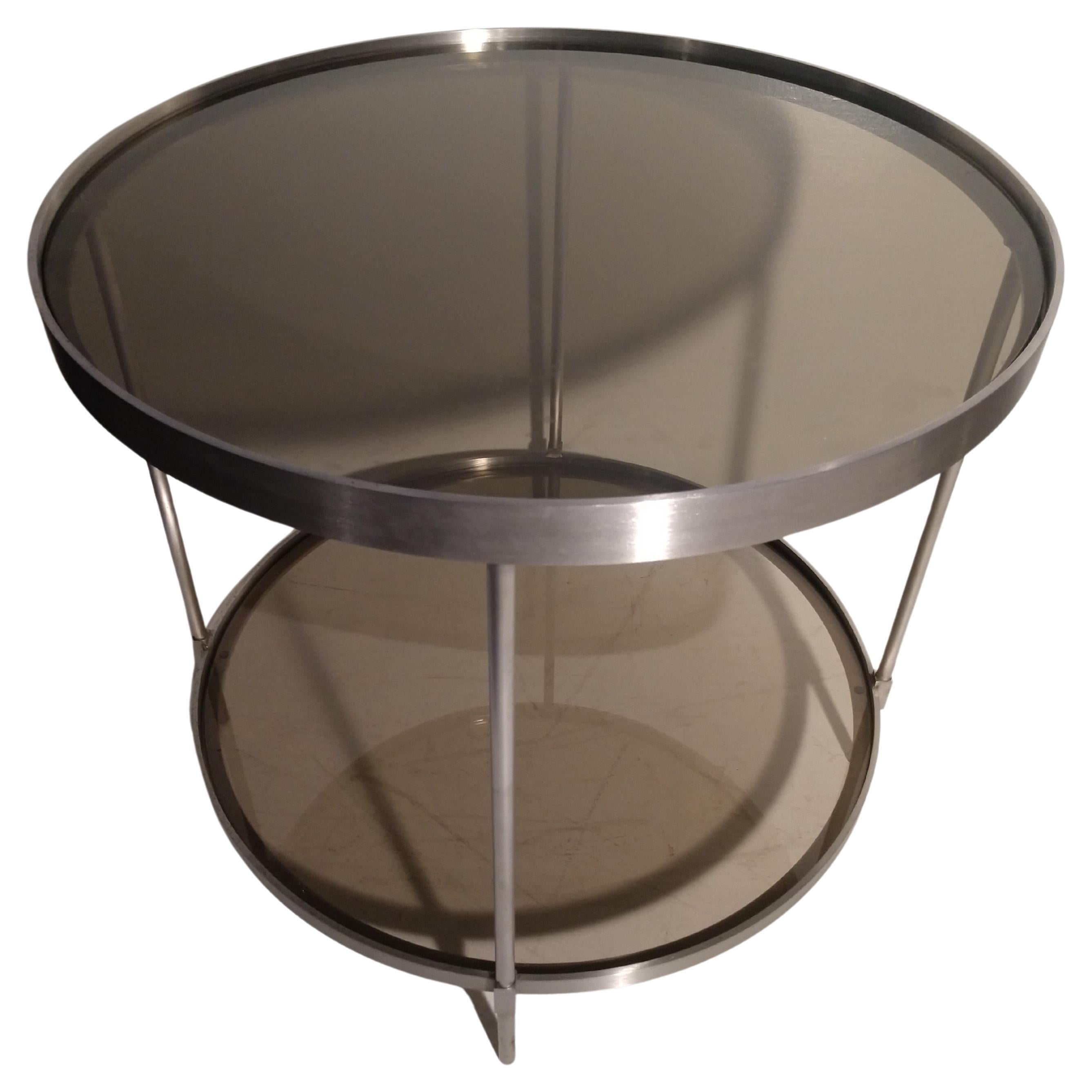 Industrial Pair of Mid Century Modern Stainless Steel Round End Tables with Smoked Glass For Sale