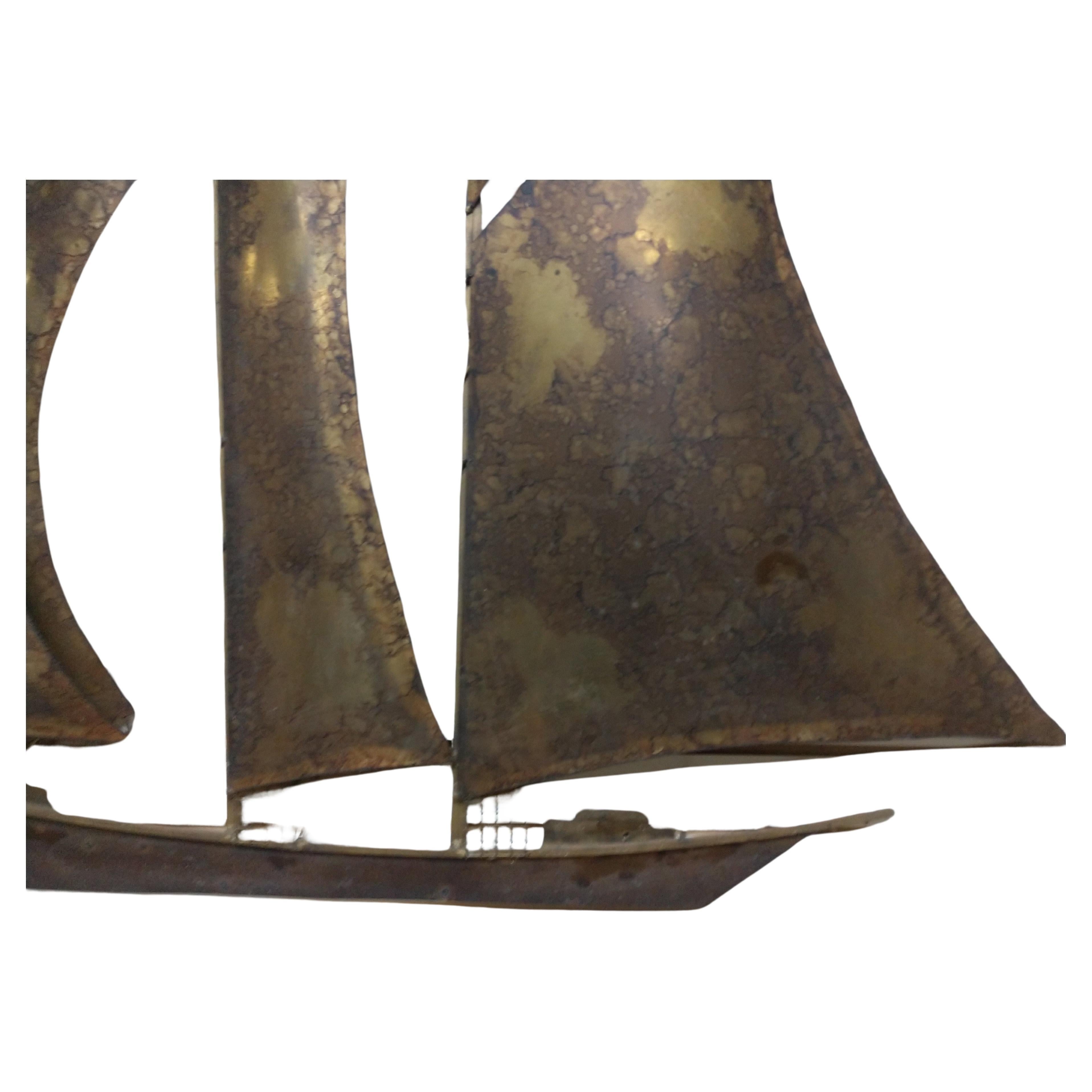 Large tall schooner ship with six masts torch cut in brass in the style of Curtis Jere. In excellent vintage condition with minimal wear. This item can be parcel posted.