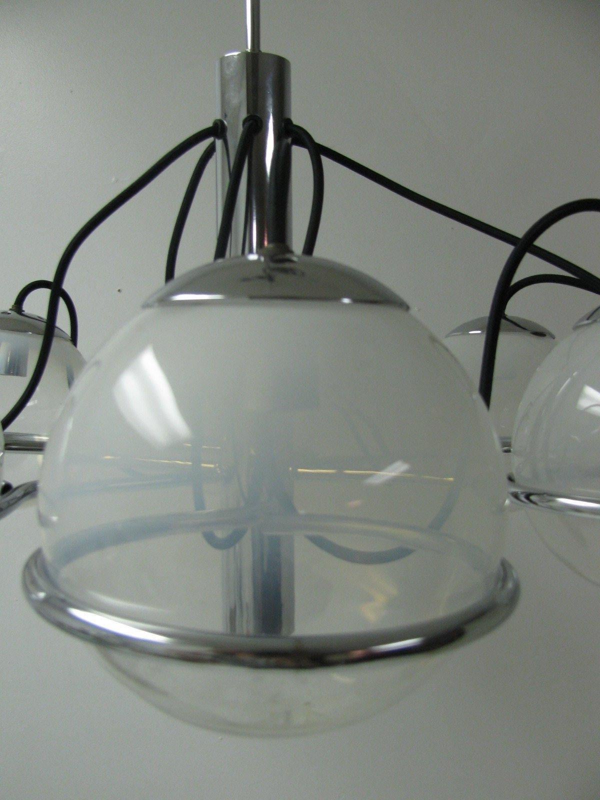 Fabulous six-light chandelier by Gino Sarfatti. Original hand blown globes sit in a nickel chrome fixture. Recently rewired with exposed cord fabric wiring. Truly a beauty with milky translucent globes which were hand blown so they are all unique. 
