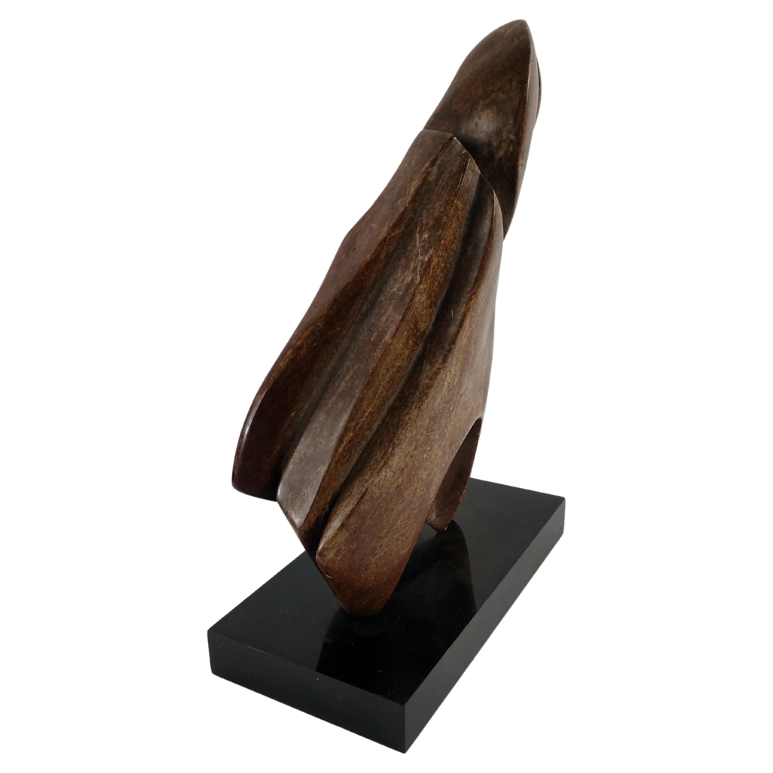 Carved stone by abstract outsider artist Louise Abrams.
This particular piece is from the artists personal collection of her own art.
Sits on a black laminate plinth base. This item can be parcel posted. We have several other works by Louise Abrahms