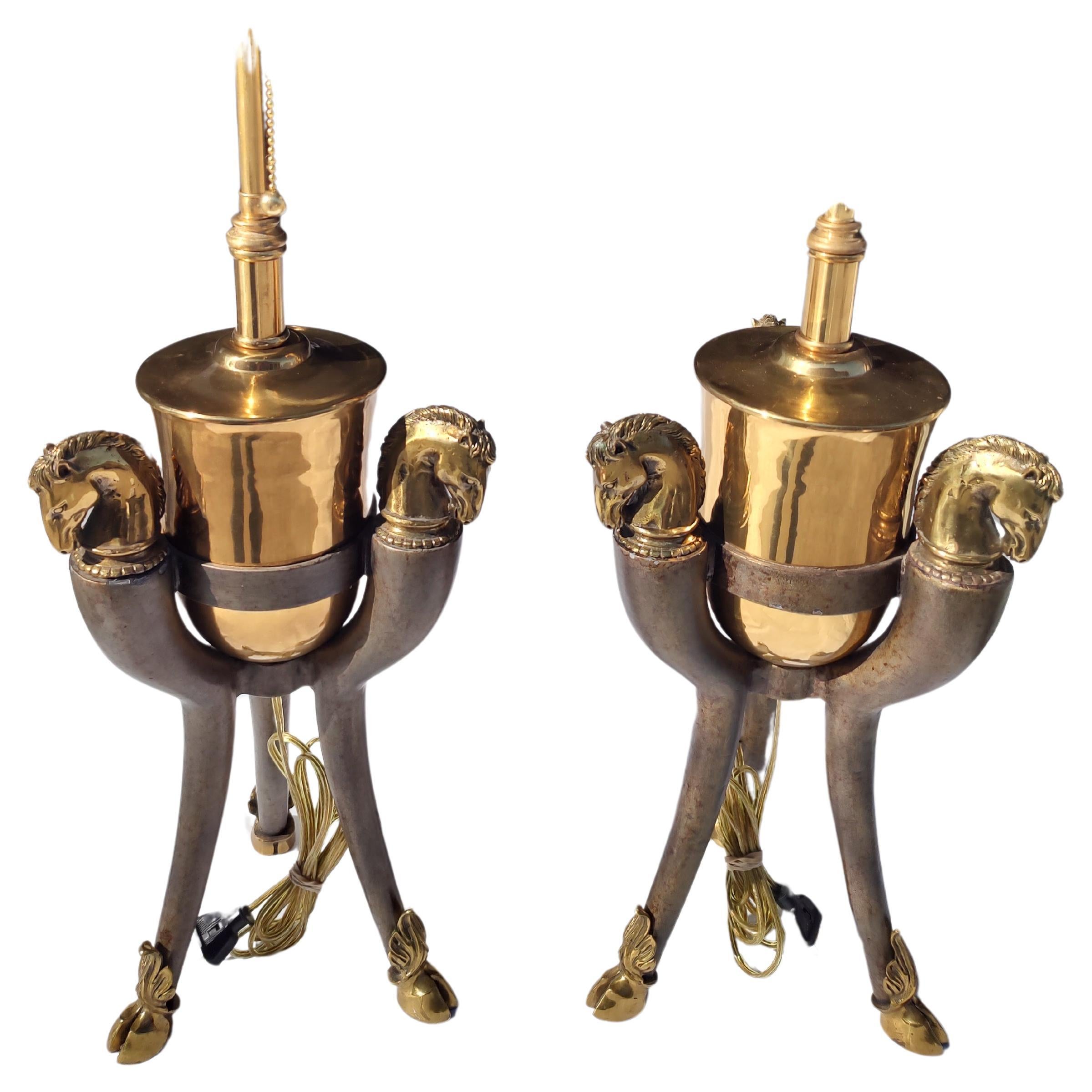 Fabulous pair of table lamps by Maitland Smith. Triangular in style with crisp detailed horse heads and hooves at the base. Legs are patinated bronze.
Totally rewired with fresh hardware and twin sockets on each lamp. One lamp with a partial