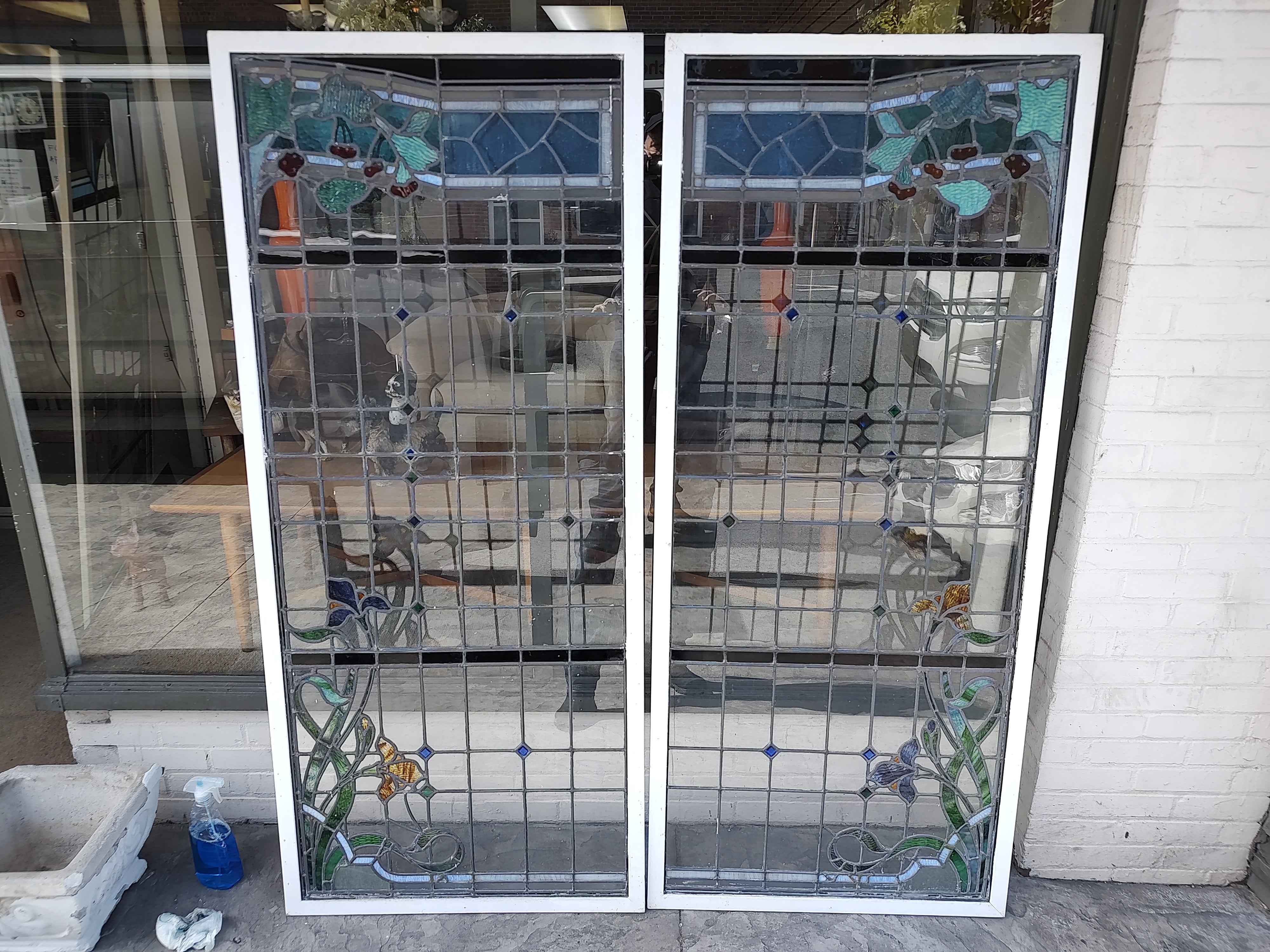 Fabulous set of 4 leaded and stained glass windows. Excellent craftsmanship and design in the framework of these 4 windows. Red cherries with other Fruit and colorful flowers and leaves in all the corners and sides. 2 sets of matching pairs. Thick