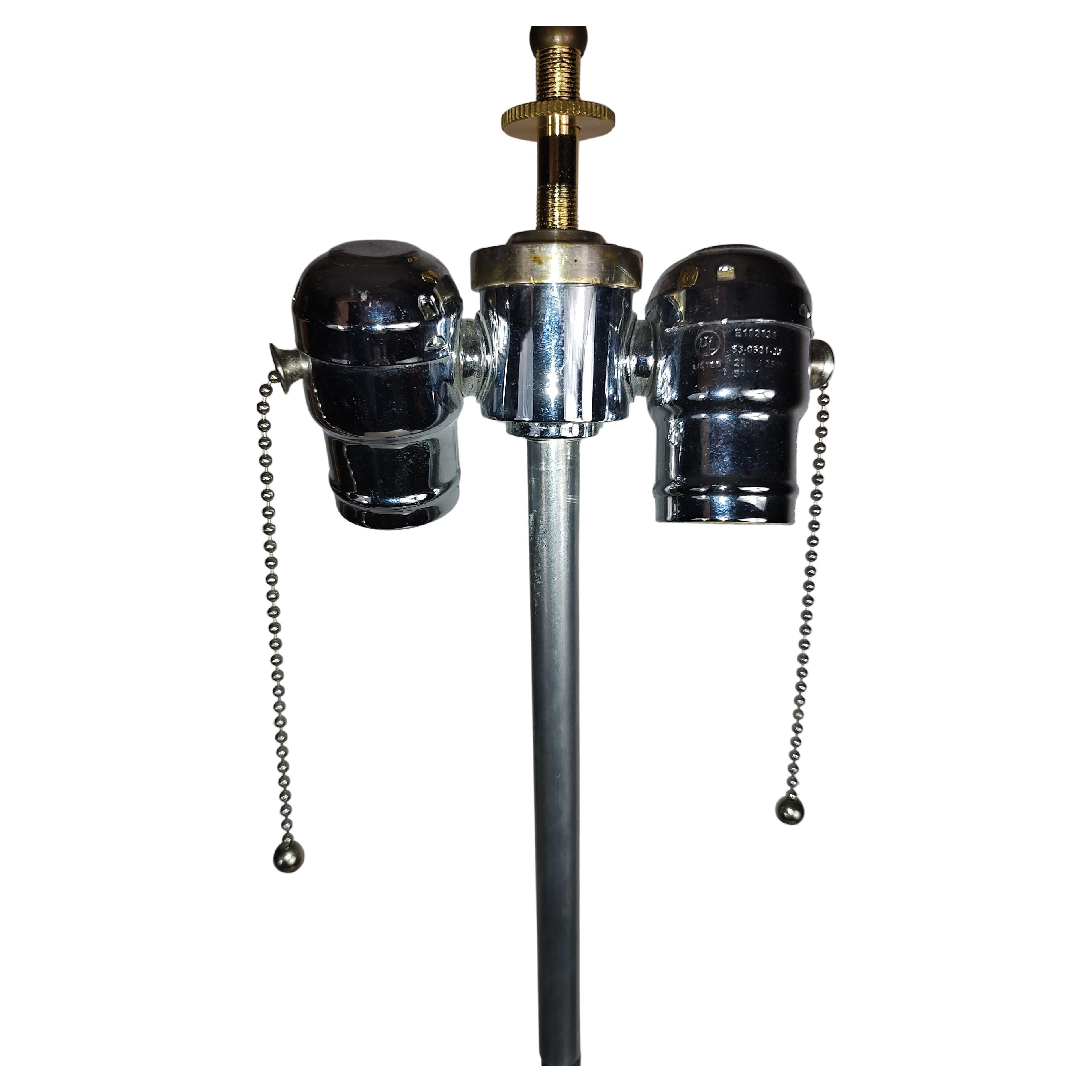 Simple and elegant tall mixed metal table lamp. Brass & aluminum in the style of the Bauhaus. In excellent vintage condition with minimal wear. New silk wiring to a double cluster socket.