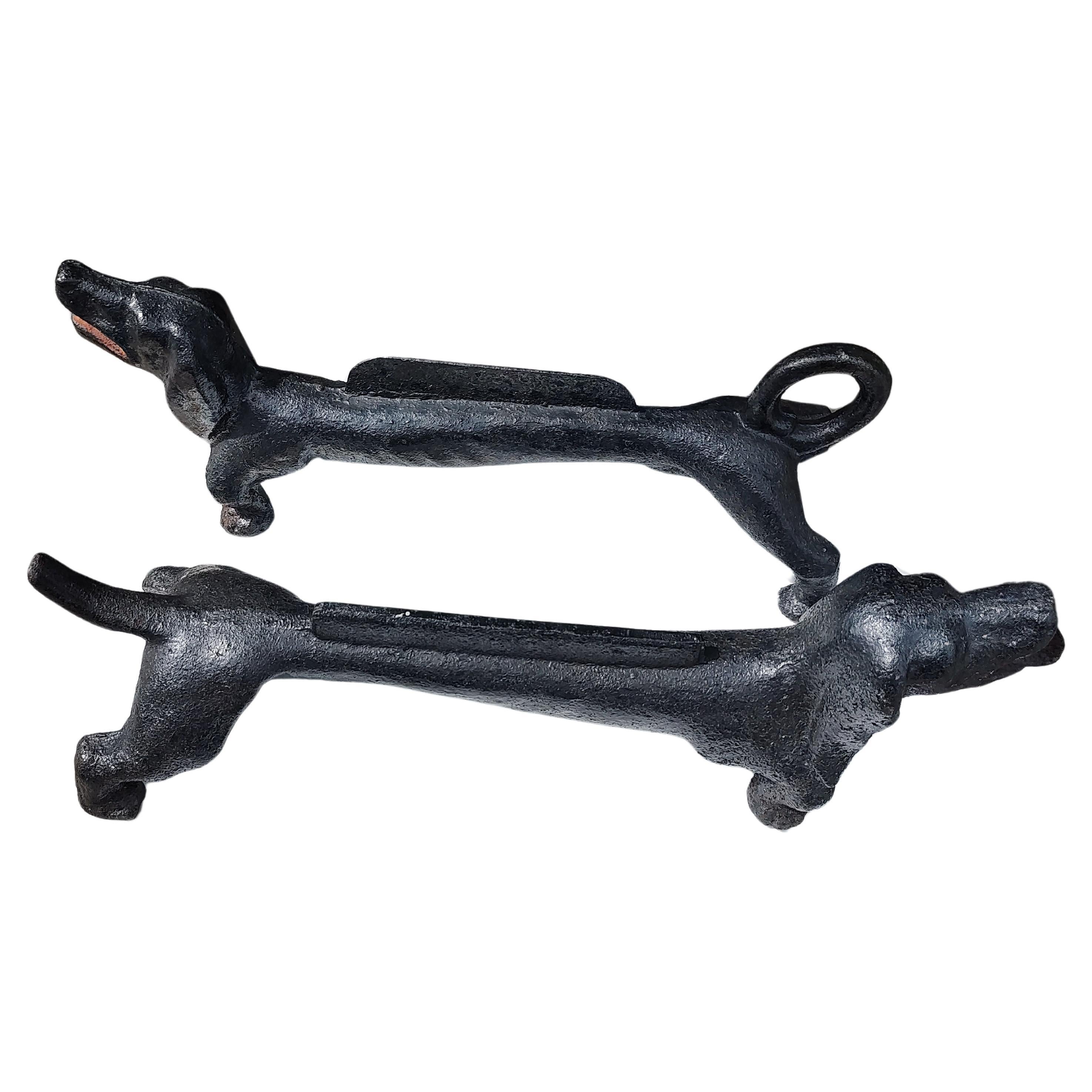 Fabulous cast iron dachshund boot scraper in black paint. Heavy, 35 lbs and stout. In excellent vintage condition with minimal wear. Can be parcel posted.