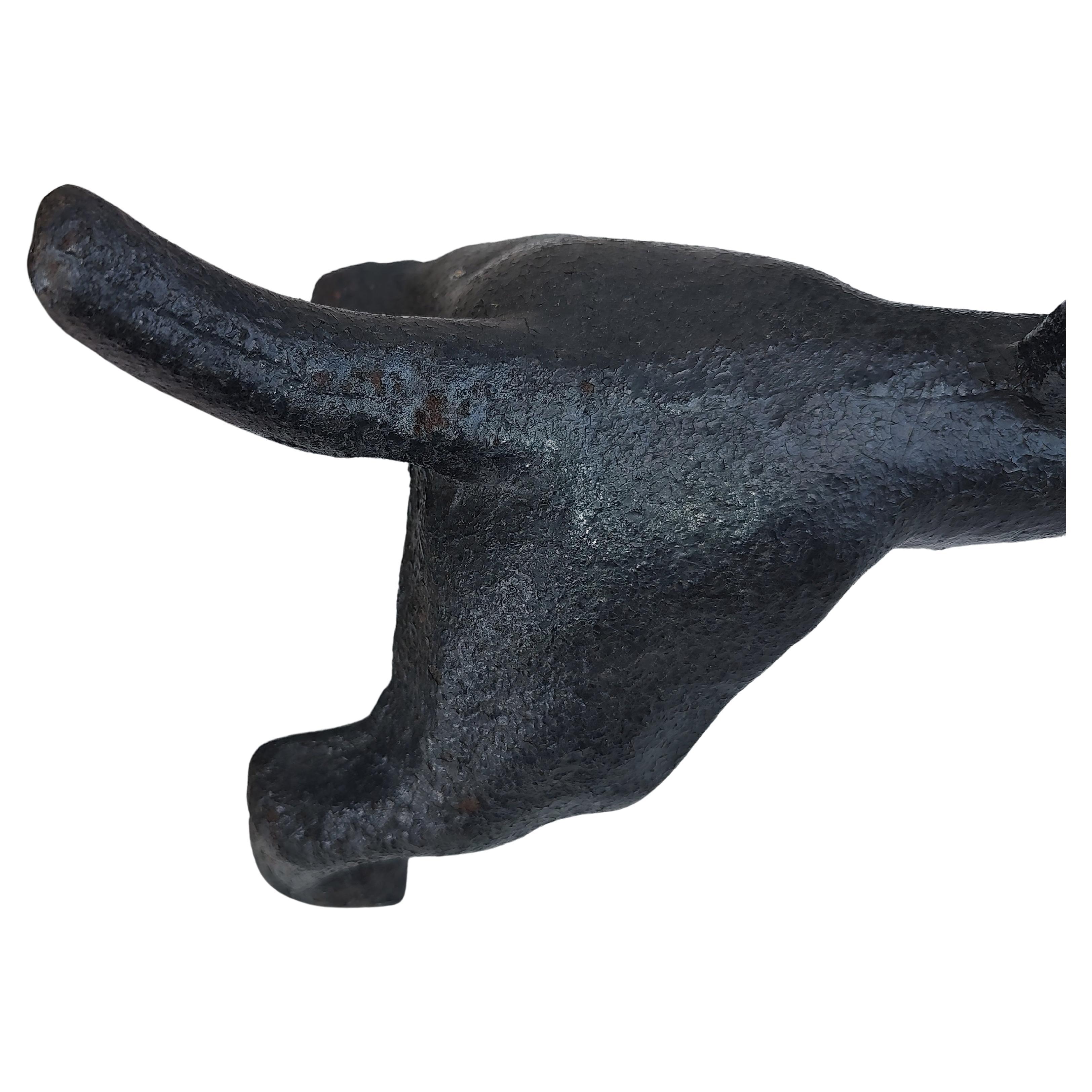 Fabulous cast iron dachshund dog boot scraper in black paint. Two available, this one has a straight tail as opposed to the other with a circle tail. Other minor differences. In excellent vintage condition with minimal wear. Can be parcel posted.