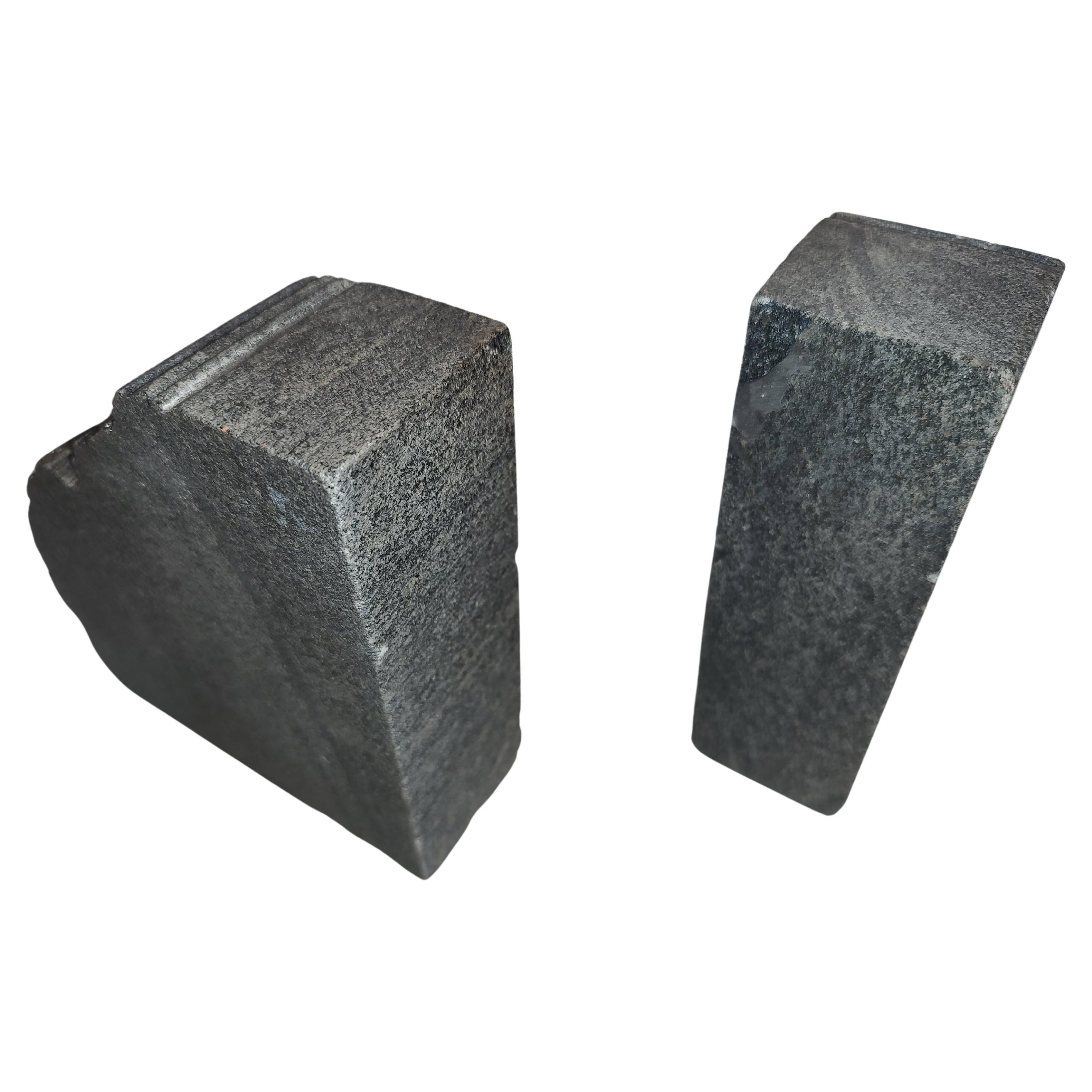 Fabulous hand chisiled pair of gray green granite bookends in a Brutalist style. Very supportive and elegant. In excellent vintage condition.