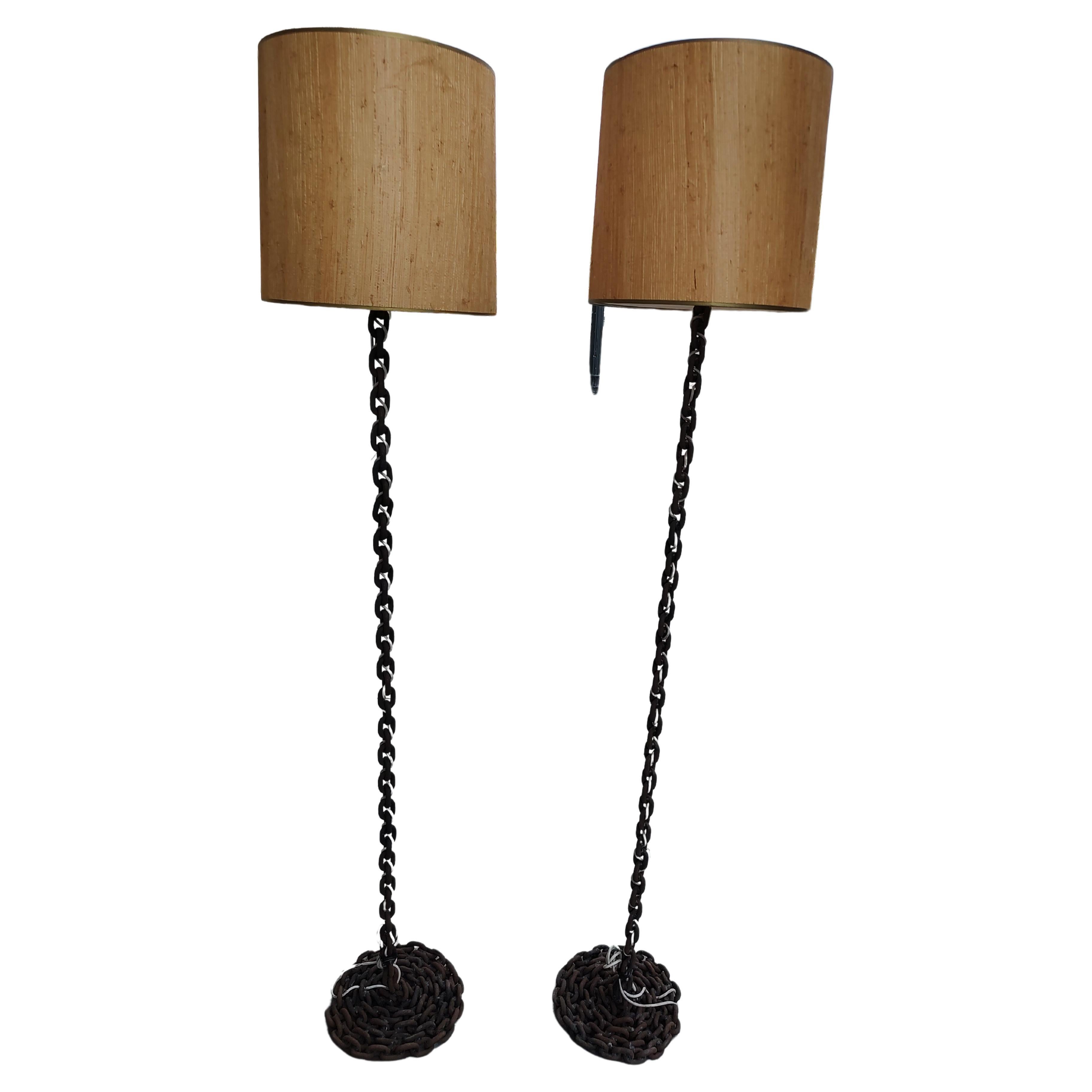Fabulous pair of Mid-Century Modern Sculptural Brutalist iron chain rope floor lamps. Rust patina deluxe. Single Edison type bulb. Heavy & stable. In excellent vintage condition with minimal wear. Shades not included.