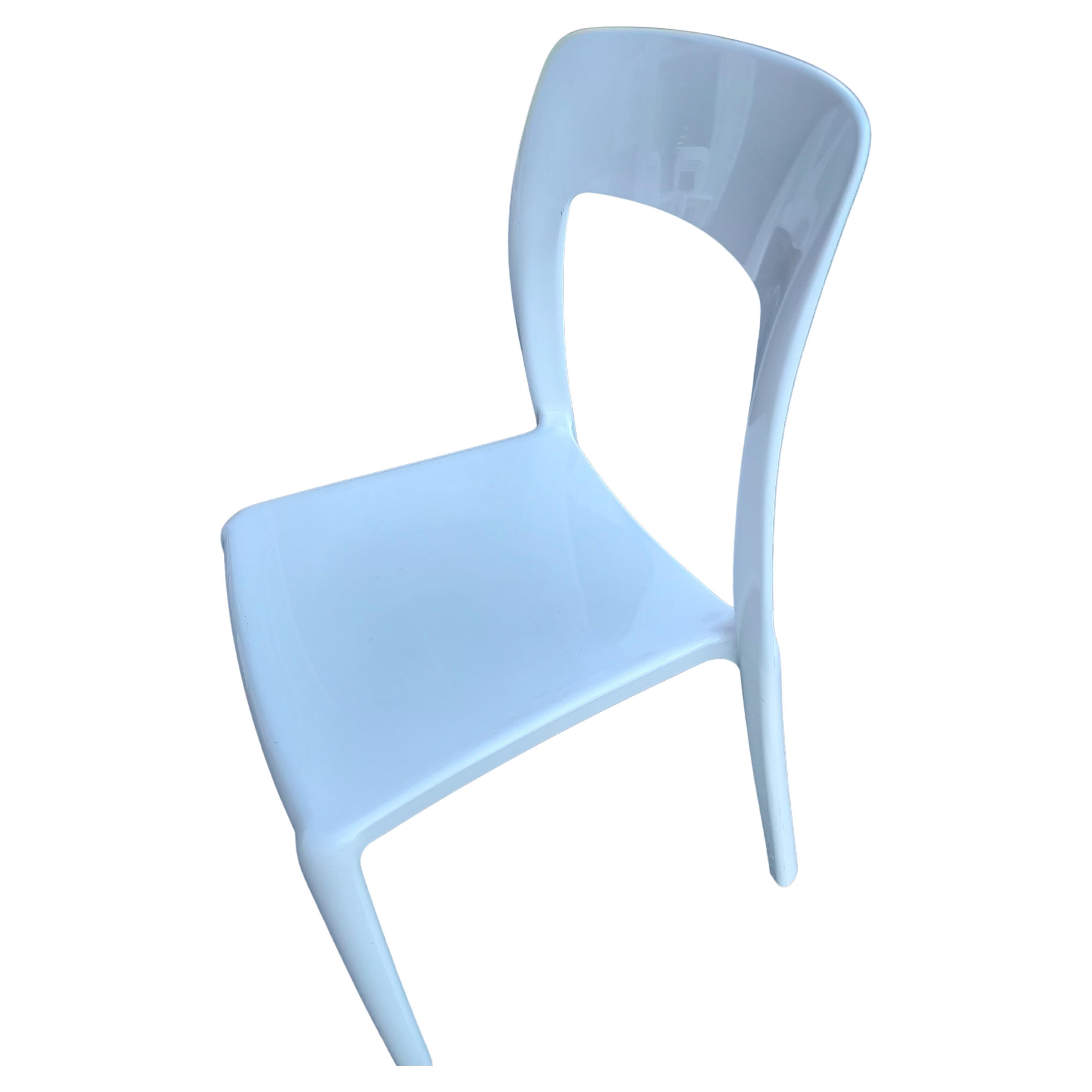 Simple and elegant set of 10 heavy duty stacking chairs in white plastic, not vinyl, by AIR.  Lucite feet on all the legs, chairs are in excellent condition with minimal wear. Stacking them is easy and can stack as many as needed for optimum space.