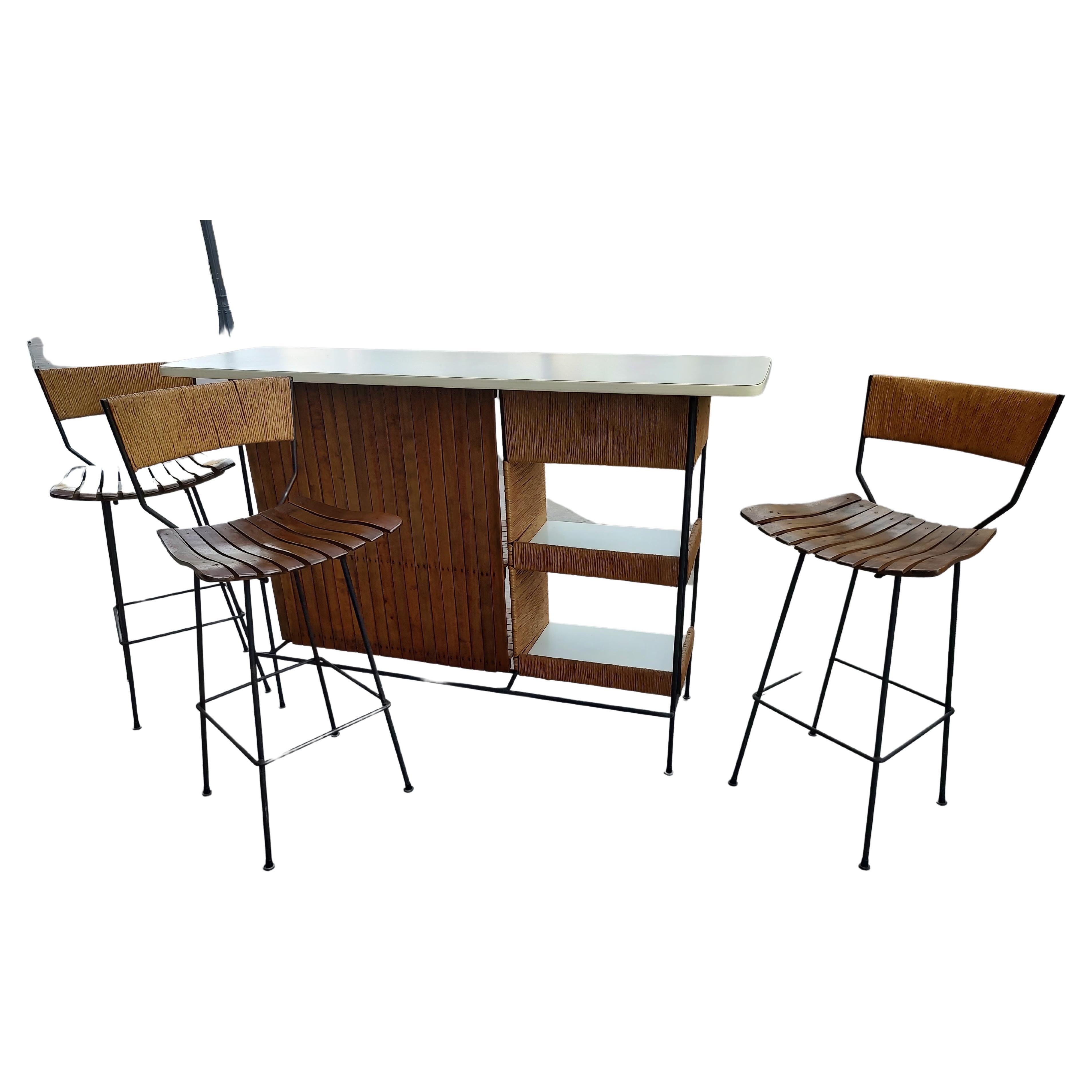 Mid Century Modern Iron Bar with Raffia and 3 Stools by Arthur Umanoff  For Sale