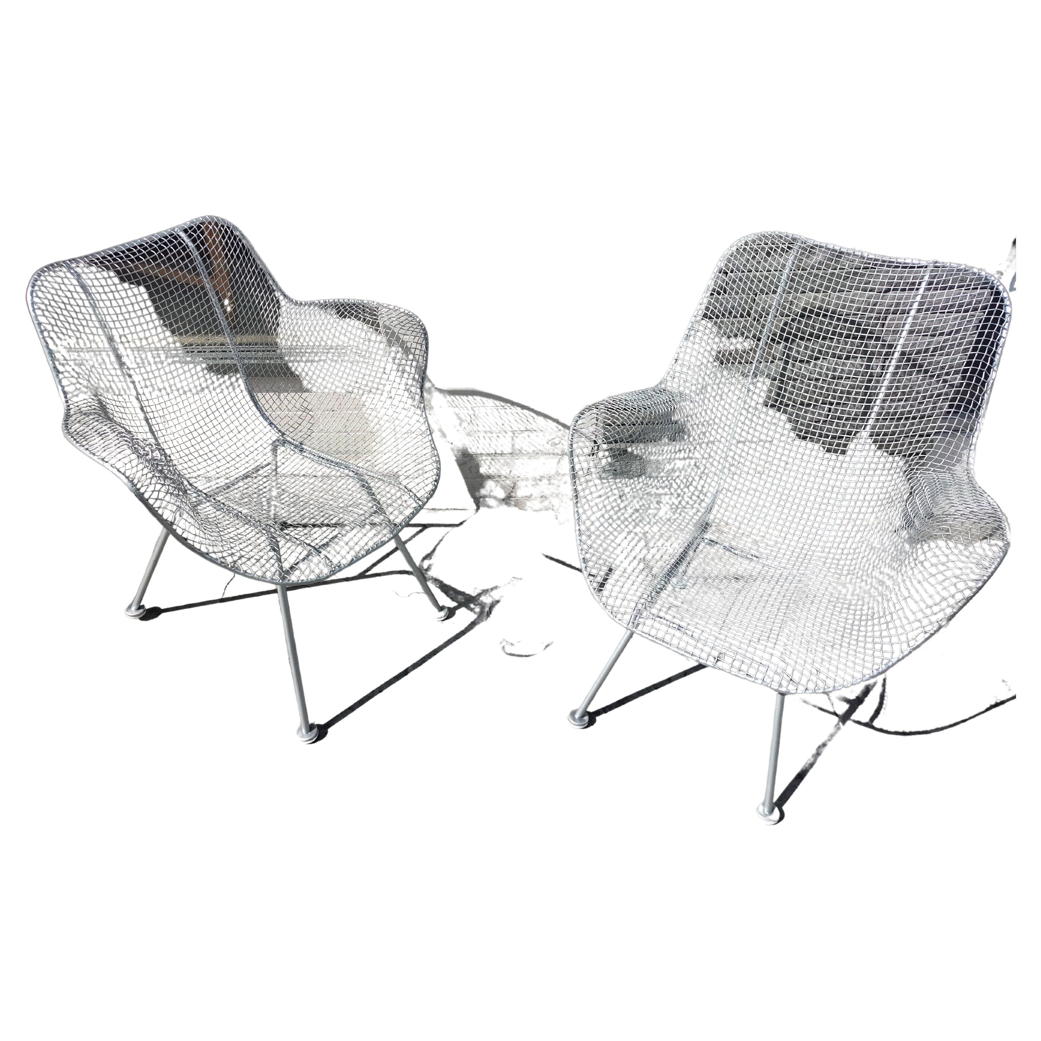 American Near Pair of Woodard Sculptura Lounge Armchairs Restored For Sale
