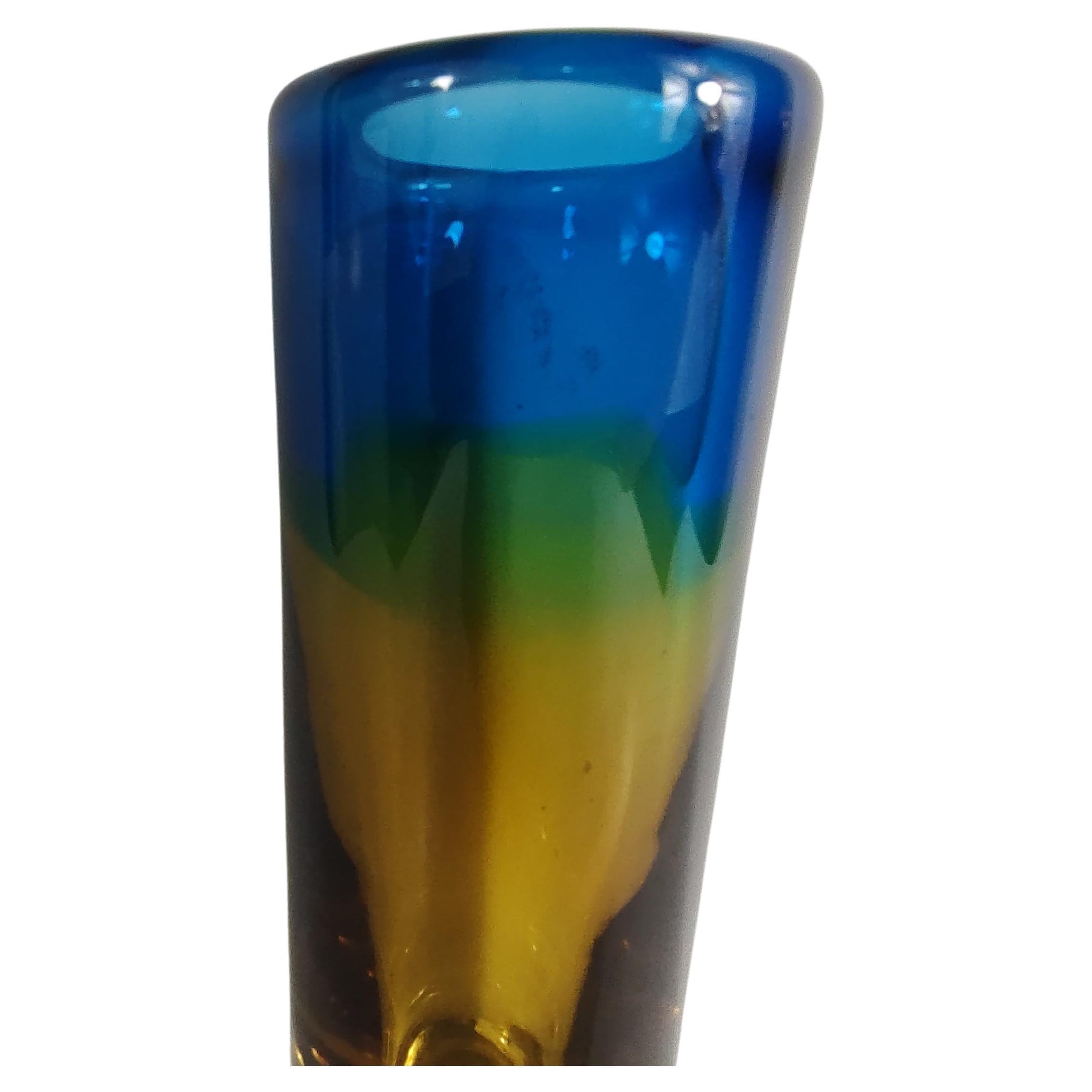 Fabulous piece of Art Glass by Vicke Lindstrand for Kosta Boda. Clear thick base which changes to yellow, green then blue. In excellent vintage condition with minimal wear to the base. No damage. Signed and numbered. Polished Pontil.