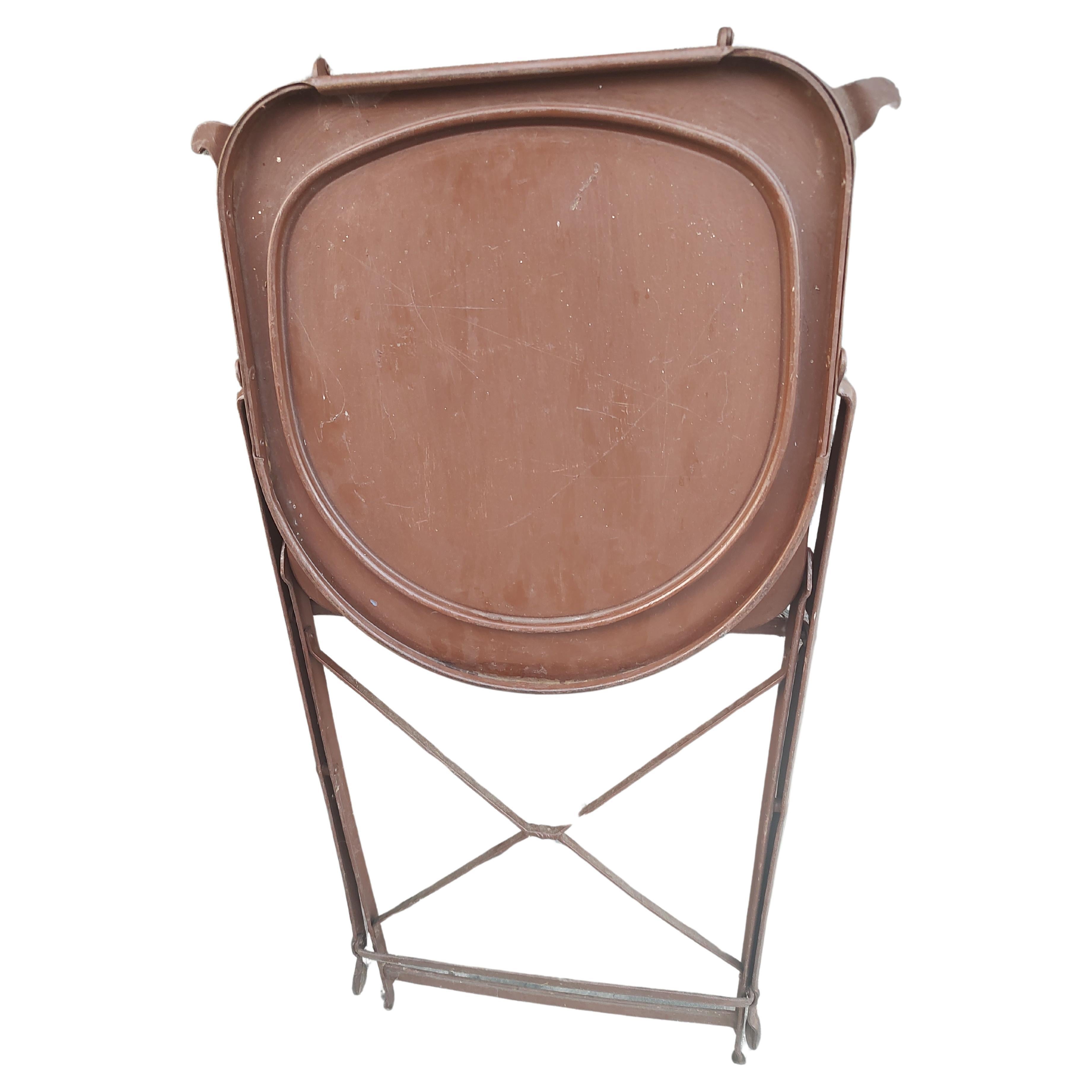 Set of 6 unique folding chairs. Seat & back collapse in a unique way, folding towards each other part. Chairs have been painted and recovered but the vinyl on a few chairs is undone, Loose. Nothing serious and we may get a chance to correct.
