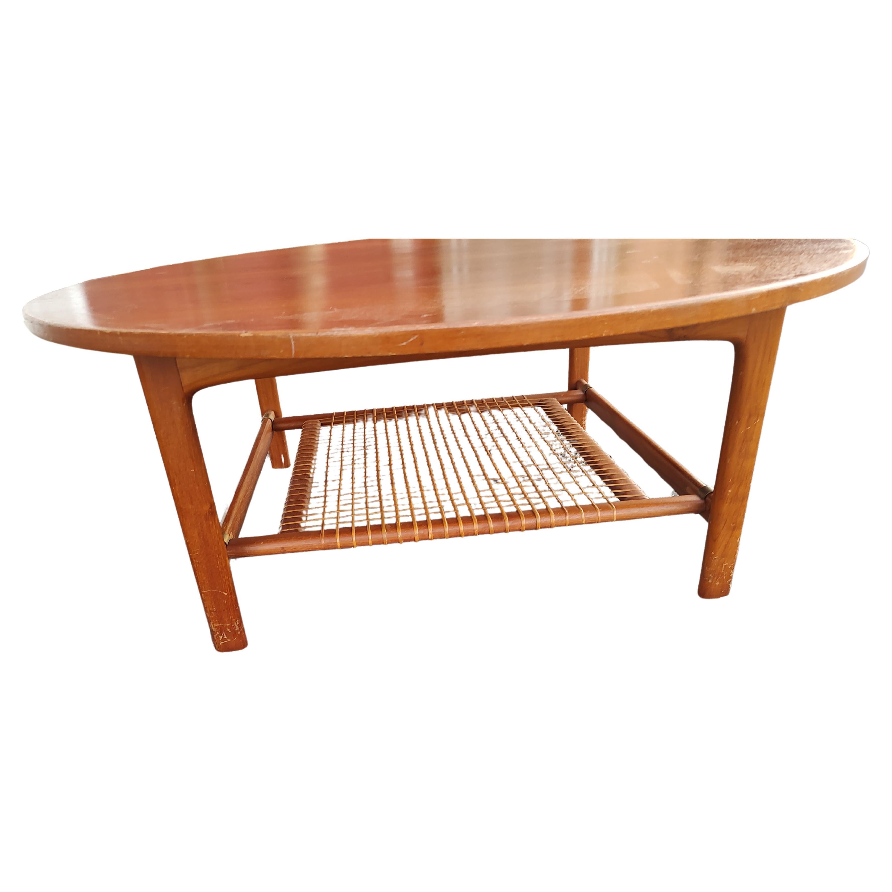 Swedish Mid-Century Modern Teak with Woven Shelf Cocktail Table by Dux Sweden - Restored For Sale