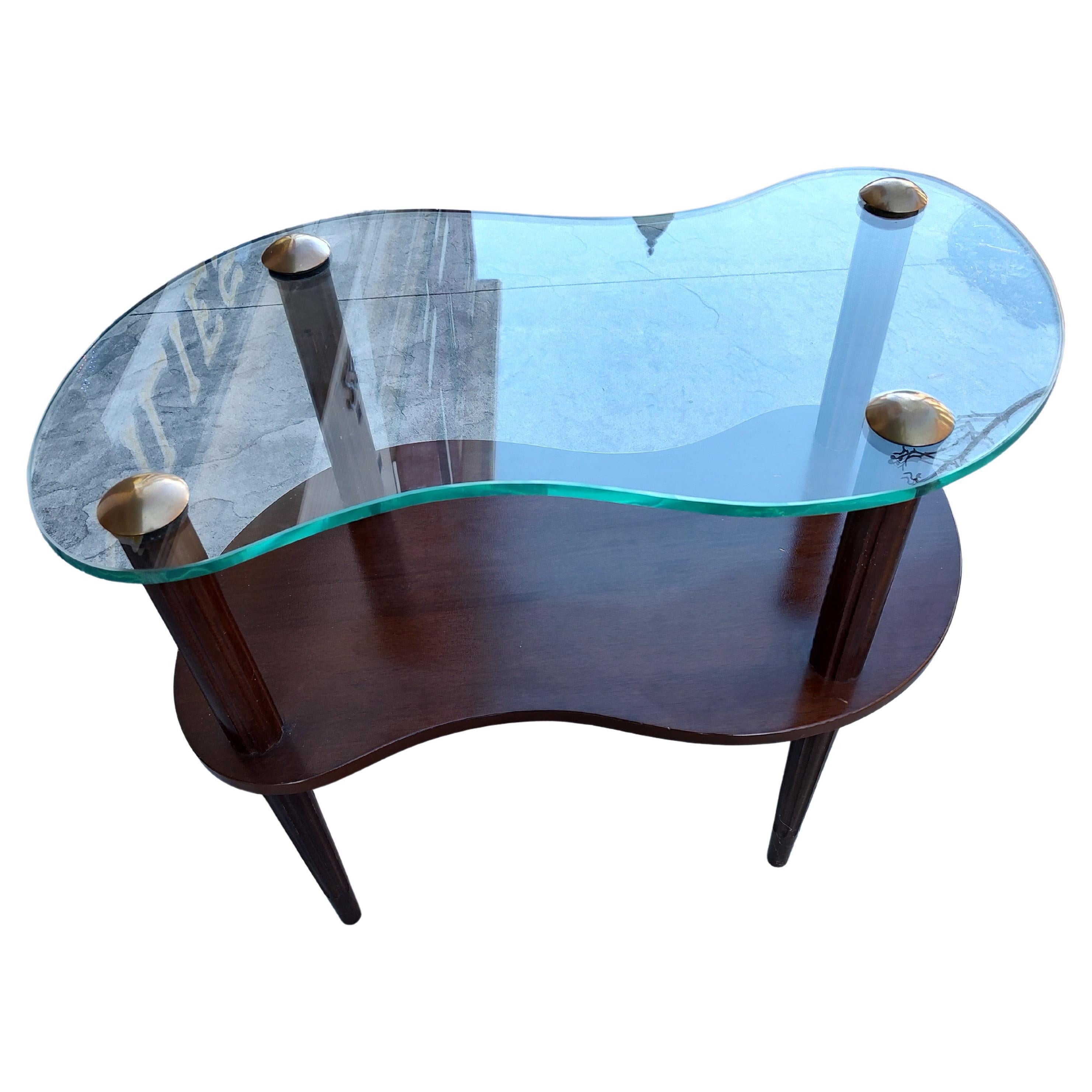 Moderne Paire de tables nuage Art Déco du milieu du siècle dernier attribuées à Gilbert Rohde  en vente