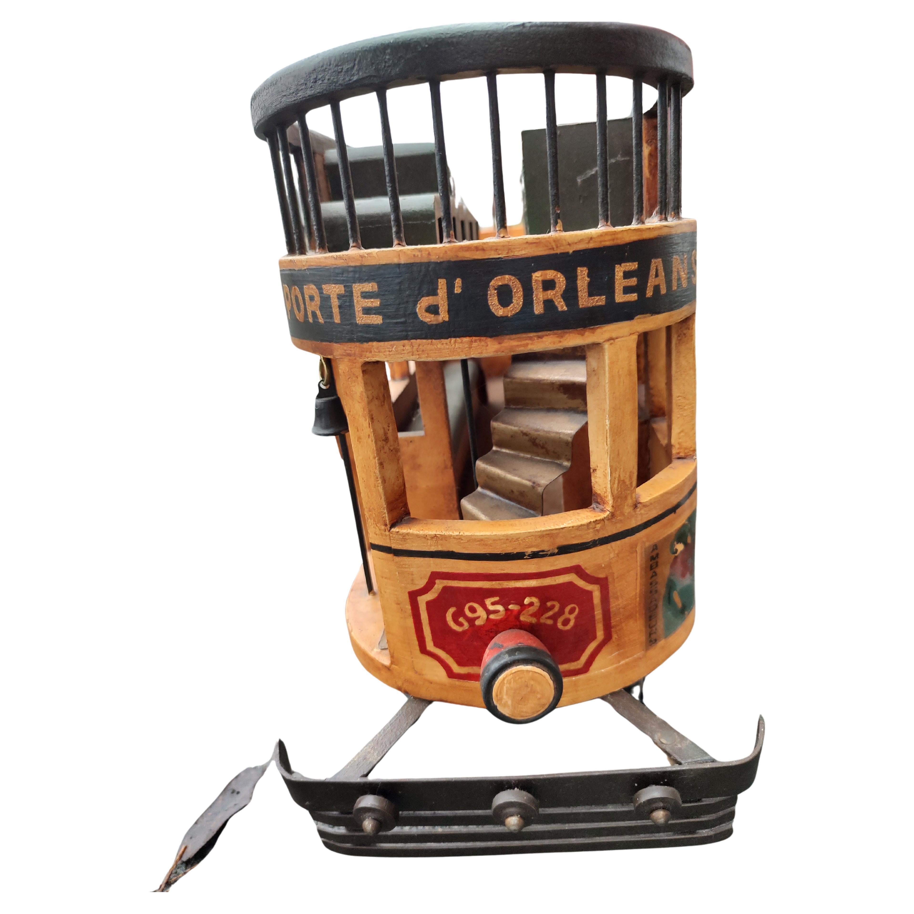 Fabulous hand painted double decker trolley car with cast iron wheels that work. In excellent vintage condition with minimal wear.