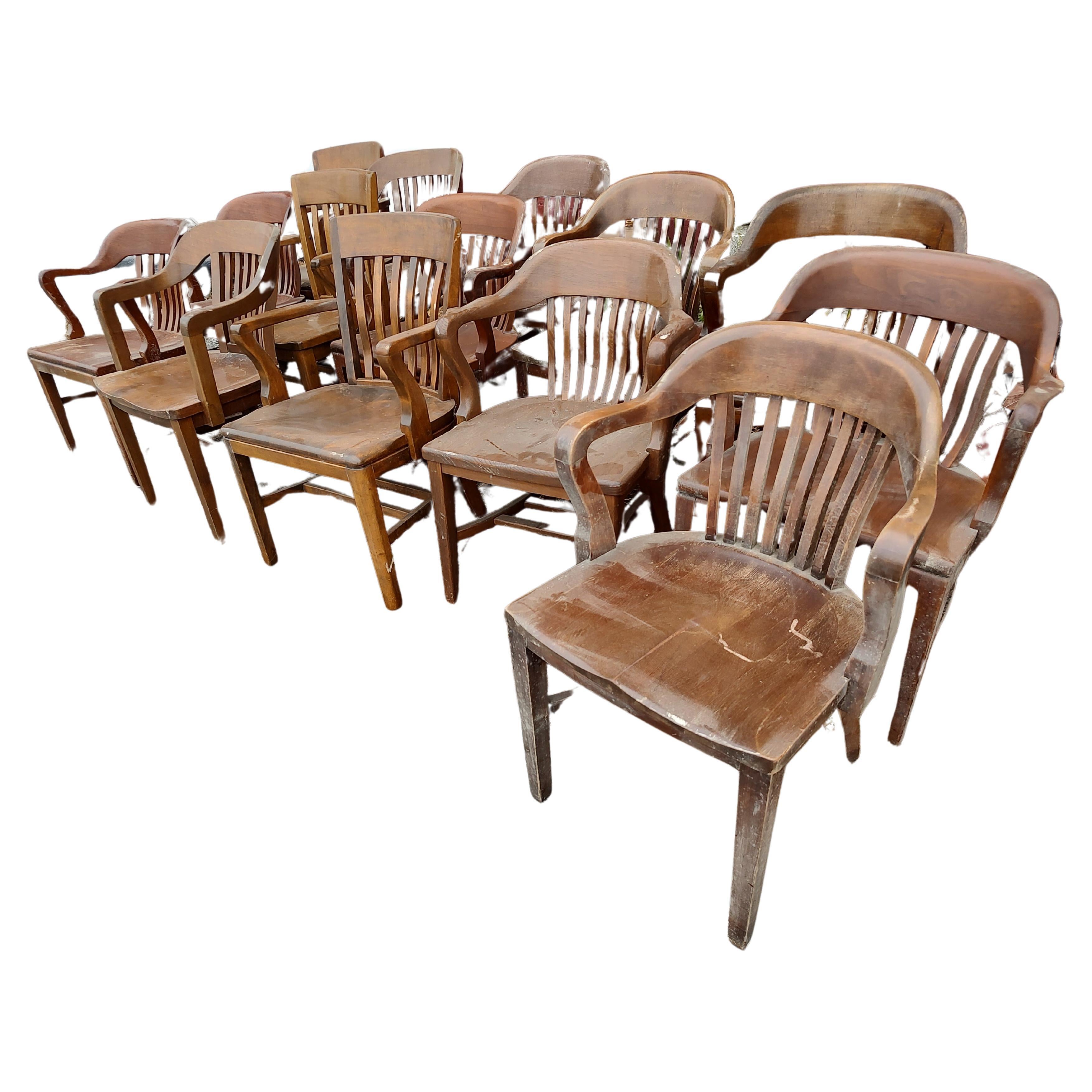 Fabulous collection of hardwood bankers chairs often found in offices, jury rooms, conference centers etc. Created from oak maple and walnut these chairs are heavy duty quality seating, great for a dining area. 3 chairs available and have some