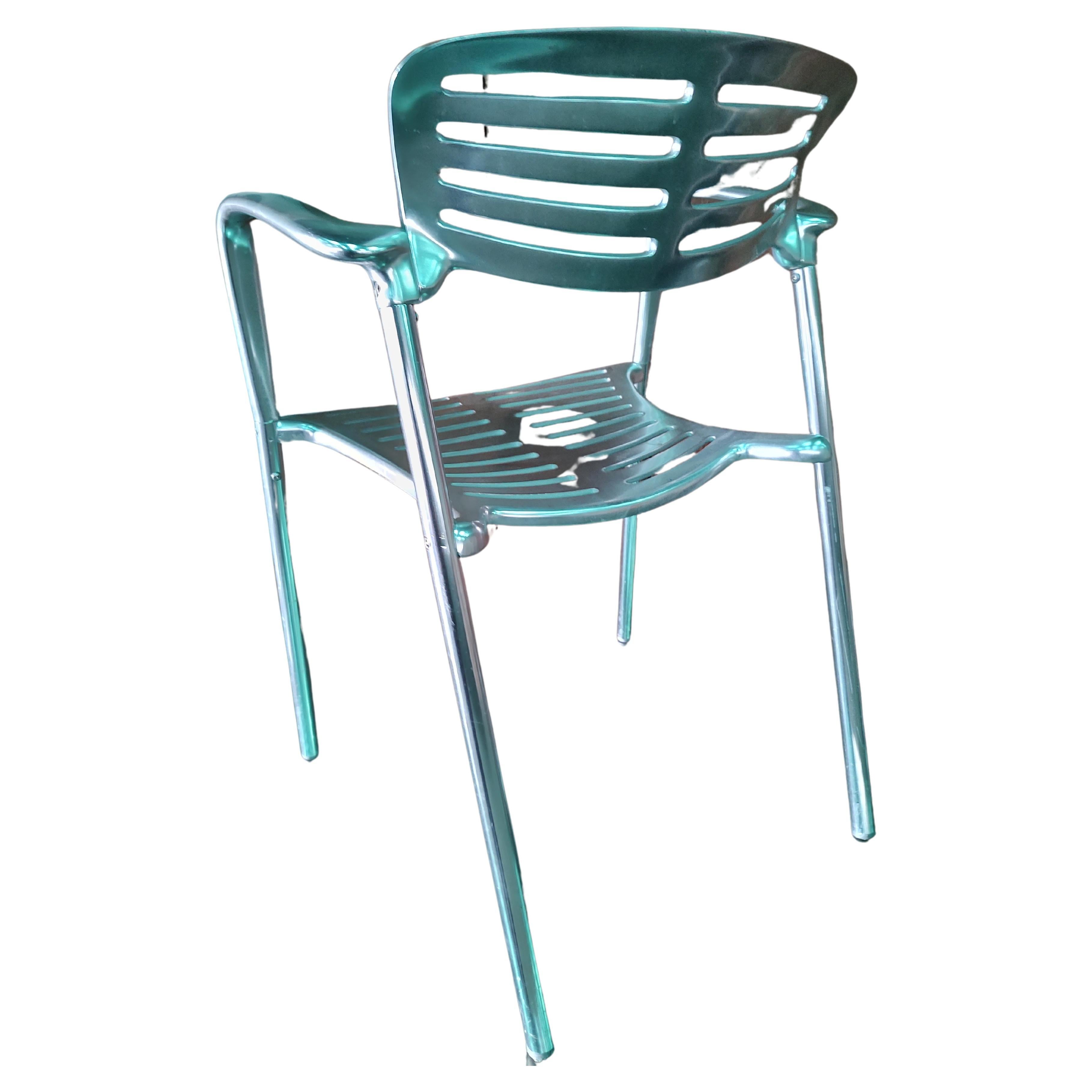 Fabulous simple yet elegant design by Jorge Pensi for Amat. Top quality cast aluminum elements which are fitted to each other. In excellent vintage condition with minimal wear. Scratches to finish, nothing deep. Chairs stack and were used in a cafe