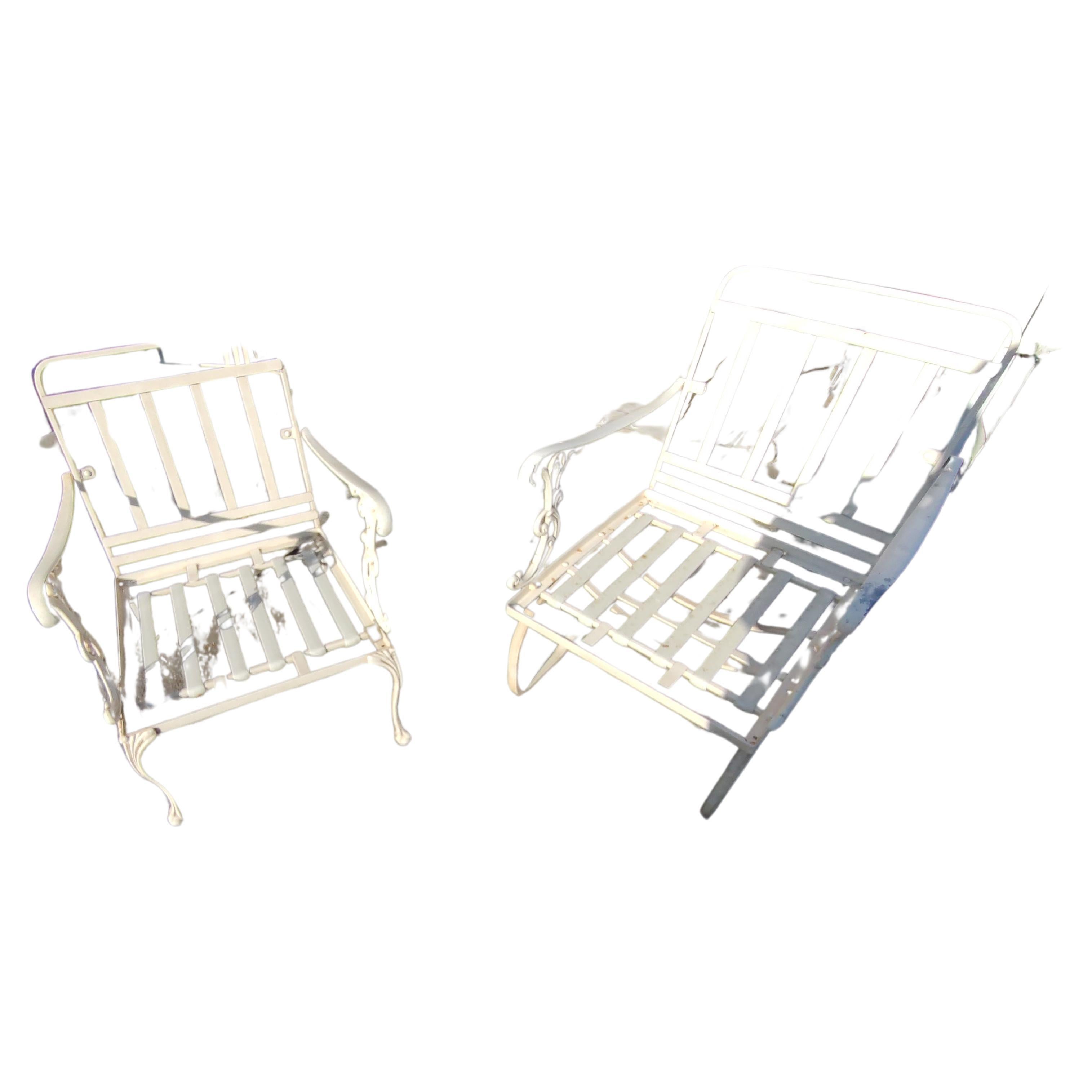 Fabulous pair of lightweight cast aluminum lounge chairs with full embossed cushions by Molla of Italy.
circa 1970 This set lived inside it's entirety. Powder coated off white it's part of a large set which is being listed piecemeal. Cushions are