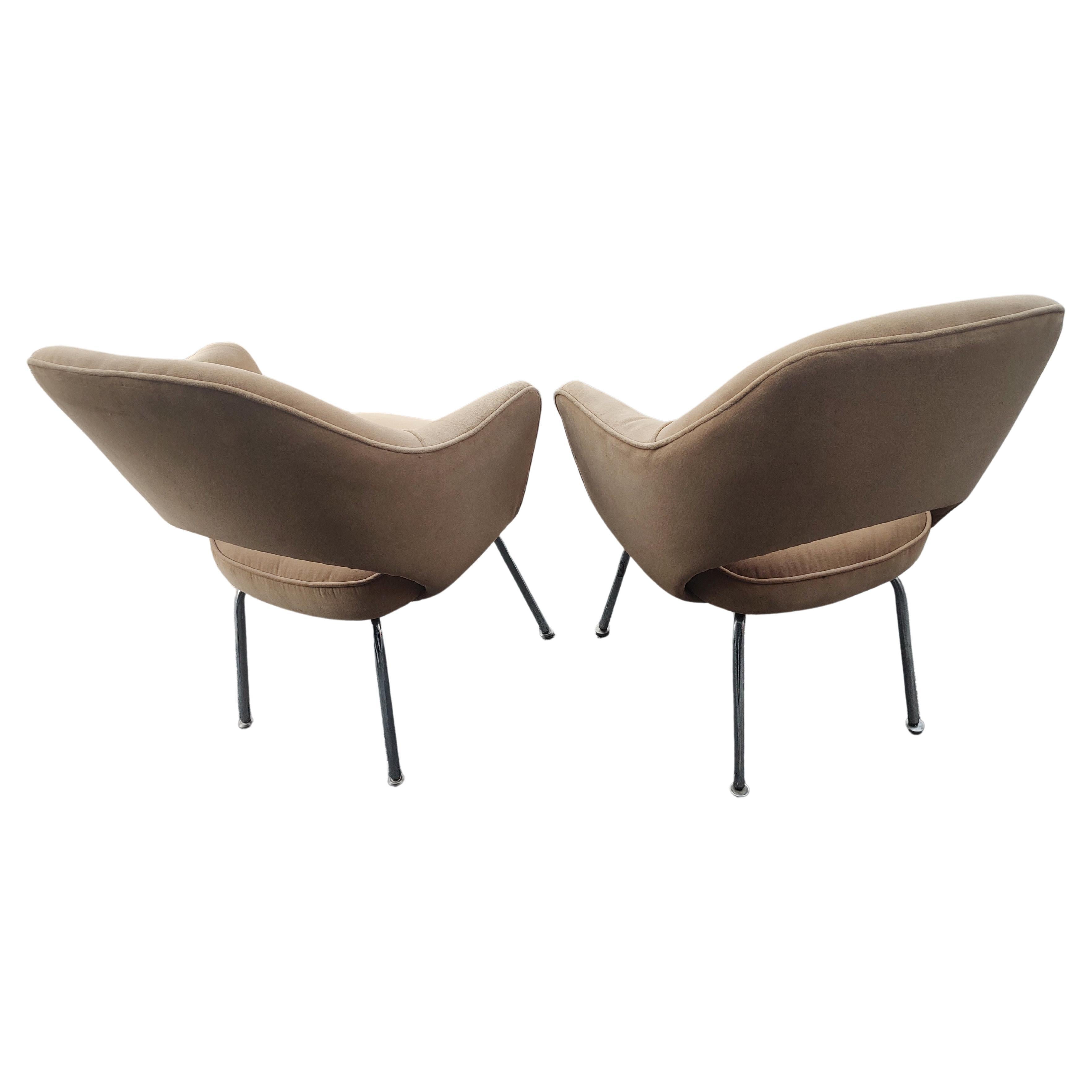 Fabulous pair of Mid-Century Modern executive armchairs by Eero Saarinen for Knoll International. Made and sold to IBM during the sixties this pair retains an IBM sticker. Structurally sound pair with serviceable fabric, see pics. Chrome legs in