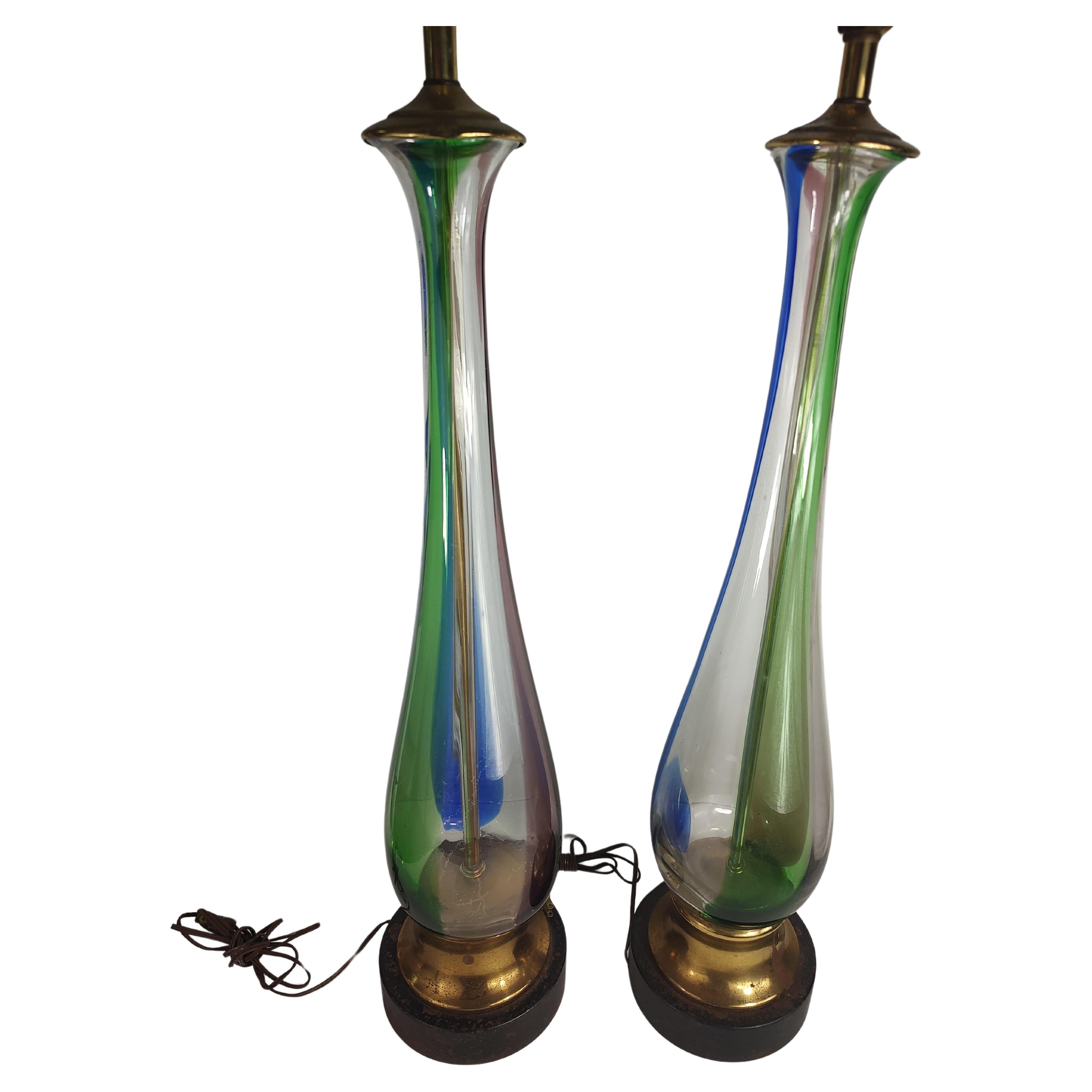 Fantastic pair of Barovier & Toso tall Murano table lamps in green red & blue swirl pattern. 34.5 to the top of the socket. Tapered and thick, bottom starts at 7 in. In excellent vintage condition with some tarnish and age related wear. Sold as a