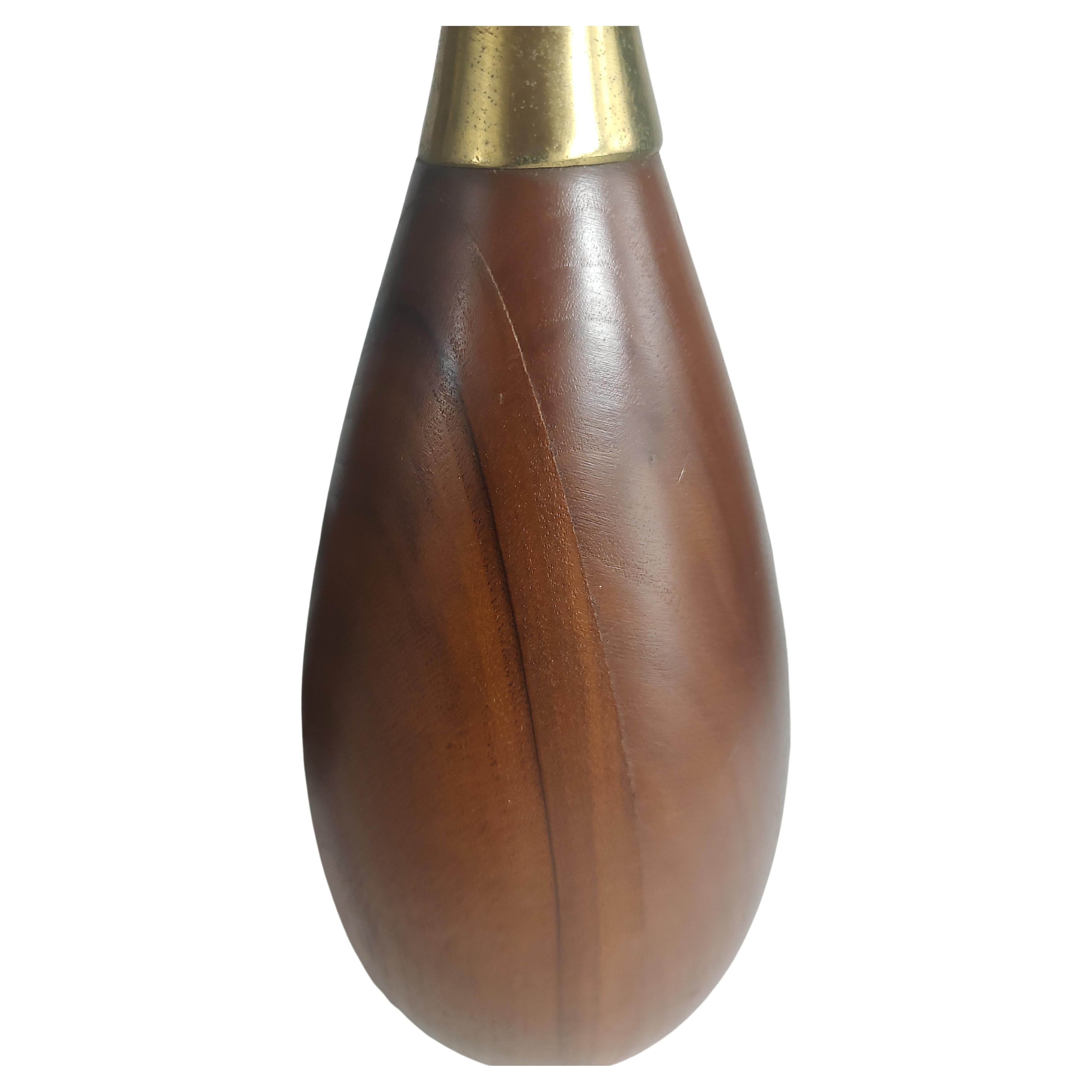Fabulous pair of mid century walnut & brass table lamps attributed to the laurel lamp co. In the form of Bowling pins. Designer Tony Paul for Westwood Industries. Height is to top of socket 18 x 5 diameter. In excellent vintage condition with