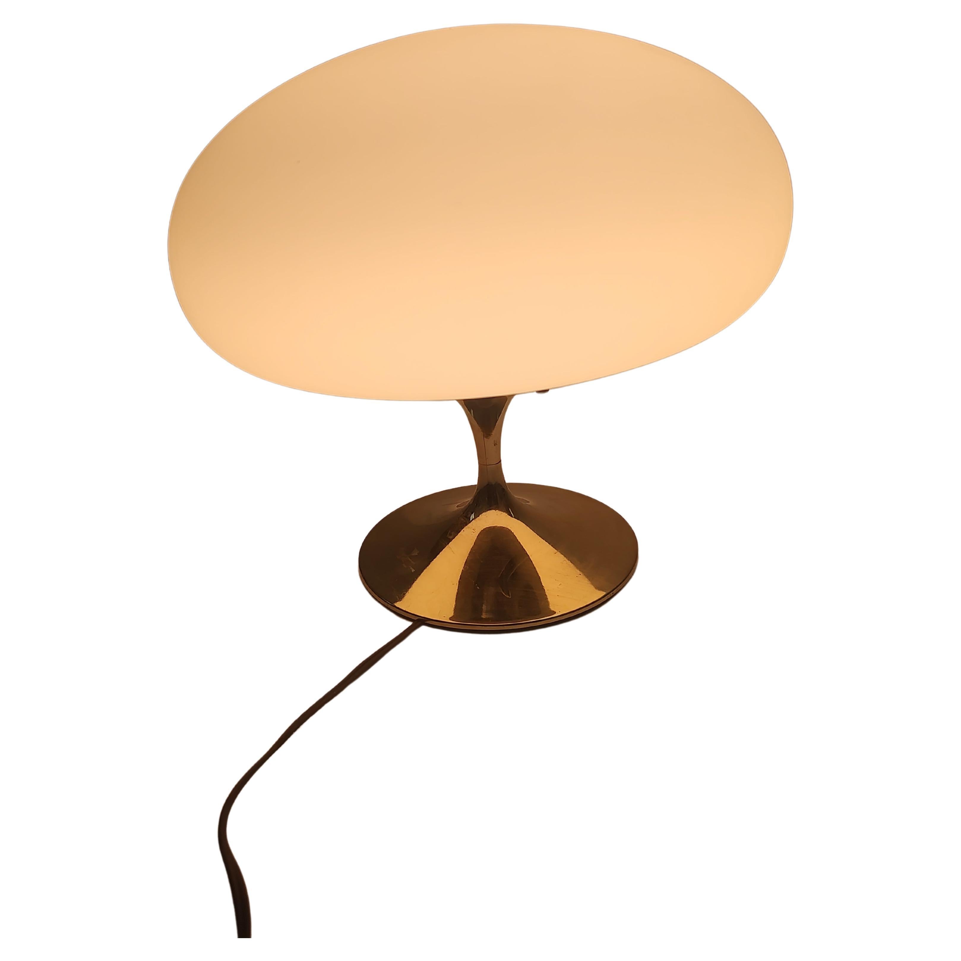 Simple yet elegant mushroom lamp attributed to the Laurel Lamp Company c1965. Milk Glass shade which sits atop a brass base with a 3-way switch. In excellent vintage condition with minimal wear. Shade is chip and crack free. We have other size