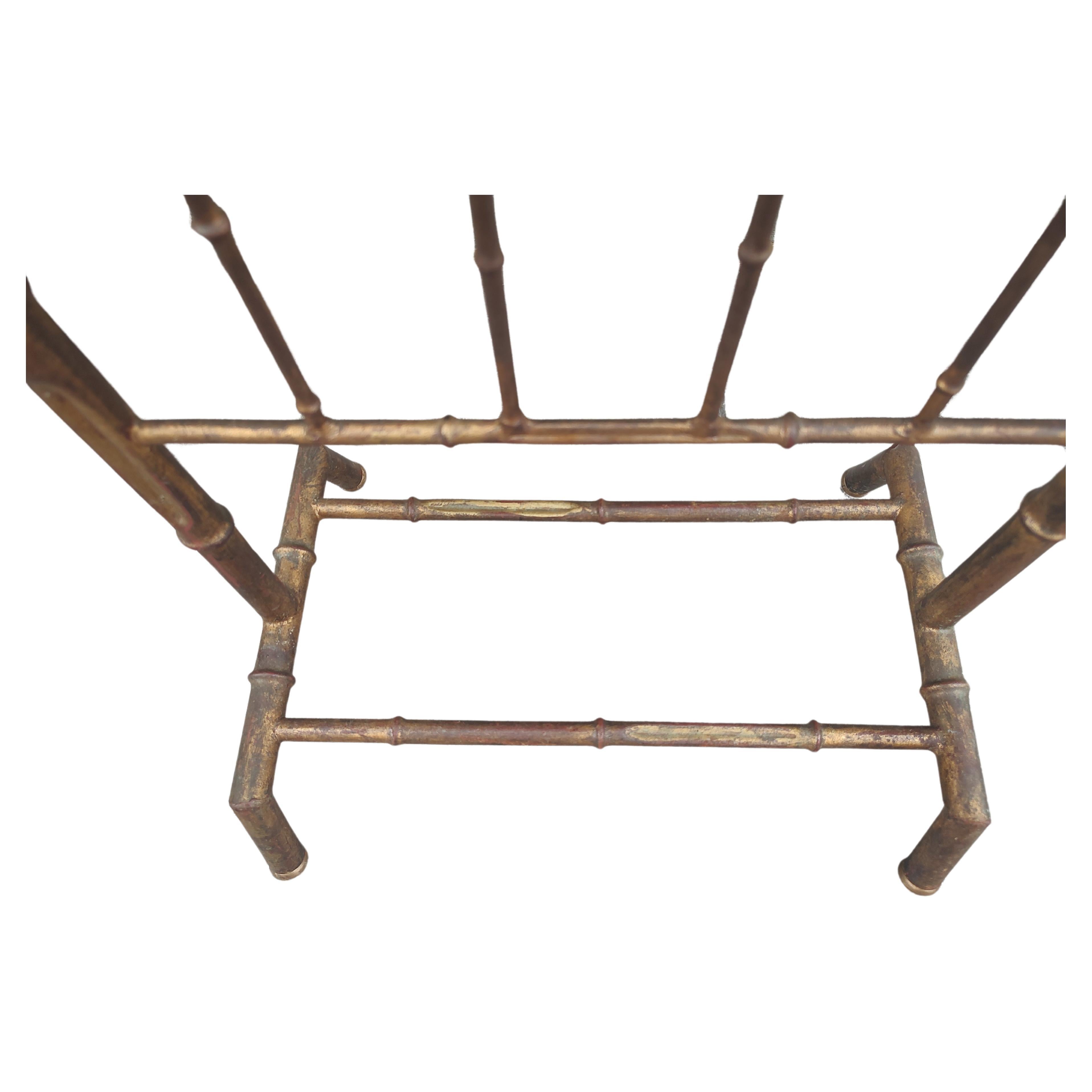 Fabulous Gilt cast iron faux bamboo form valet with all the necessary racks for your daily clothes. Wear on top to the Gilt otherwise in excellent vintage condition with minimal wear.