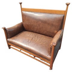 Scottish Arts & Crafts Leather and Oak Loveseat attributed to Wylie & Lochhead