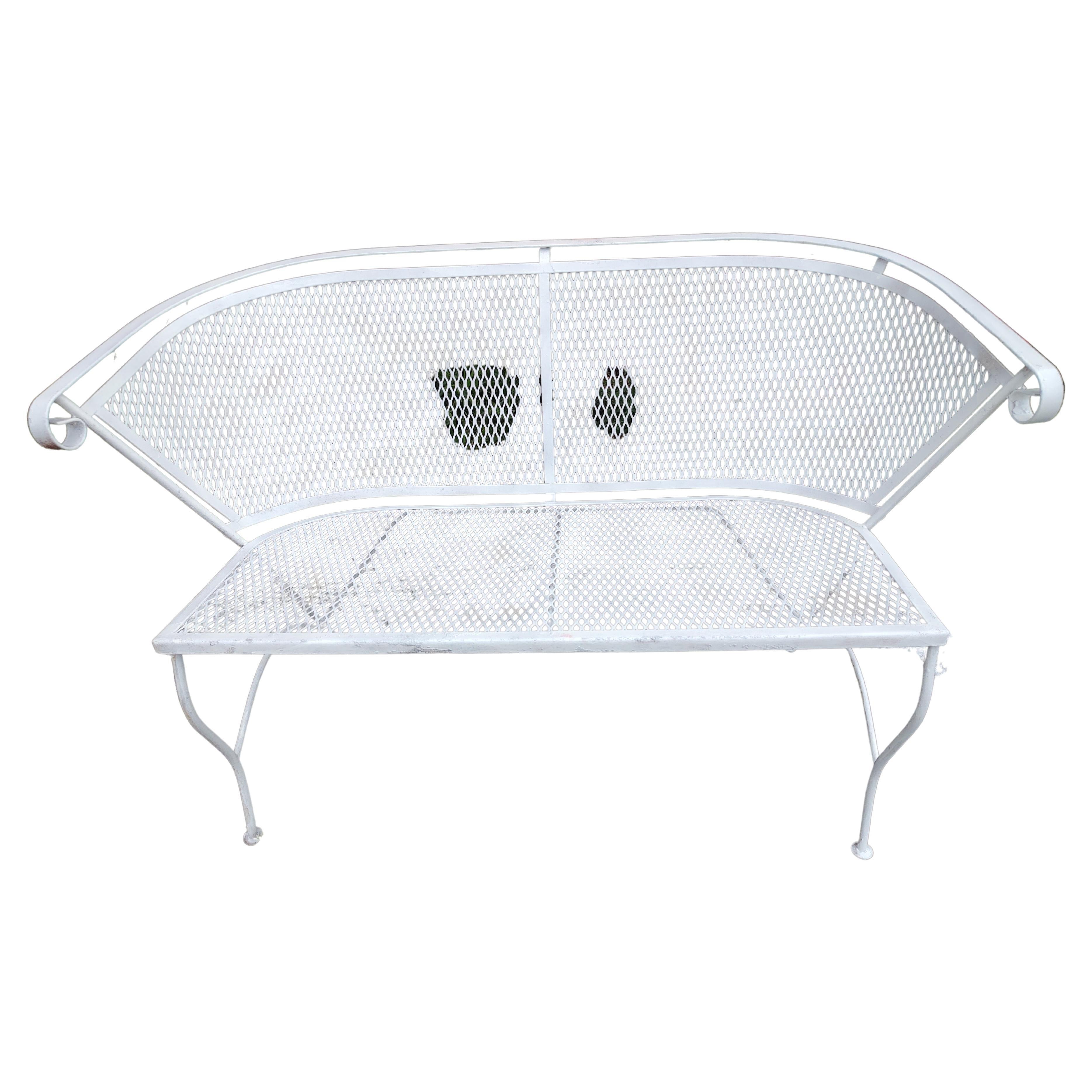 Petite two seat outdoor garden bench with mesh seat & back attributed to Russell Woodard co. Recently sprayed white so it's its in very good vintage condition with minimal wear, no rust. Seat clamps into place so it's easy to store in off season. We