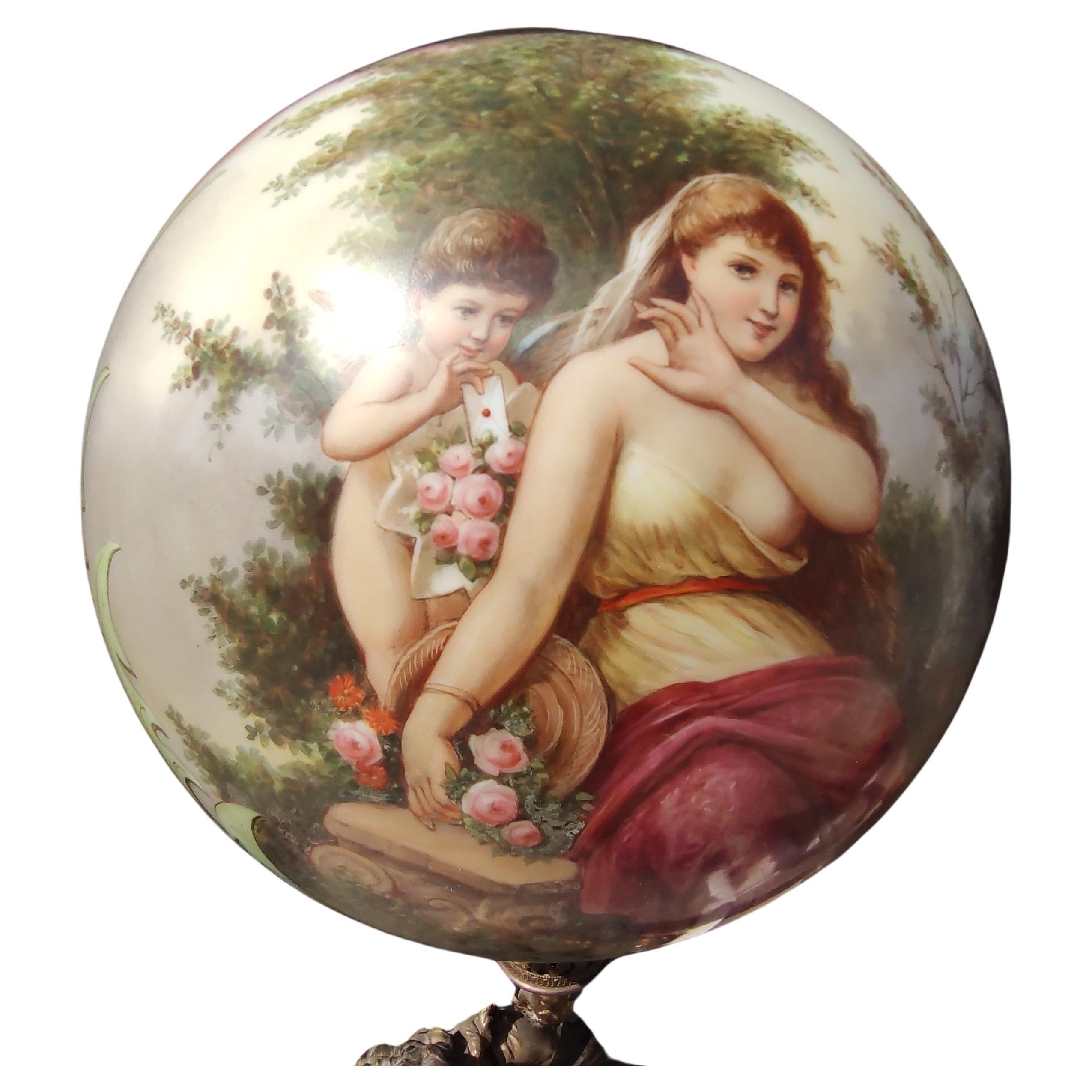 Spectacular Victorian Style hurricane gas lamp conversion to electric Gone With The Wind Table Lamp. Large, 11in hand painted globe by a member of the Ahne family. Globe depicts a maiden with a cherub in the background. In excellent condition. Lamp