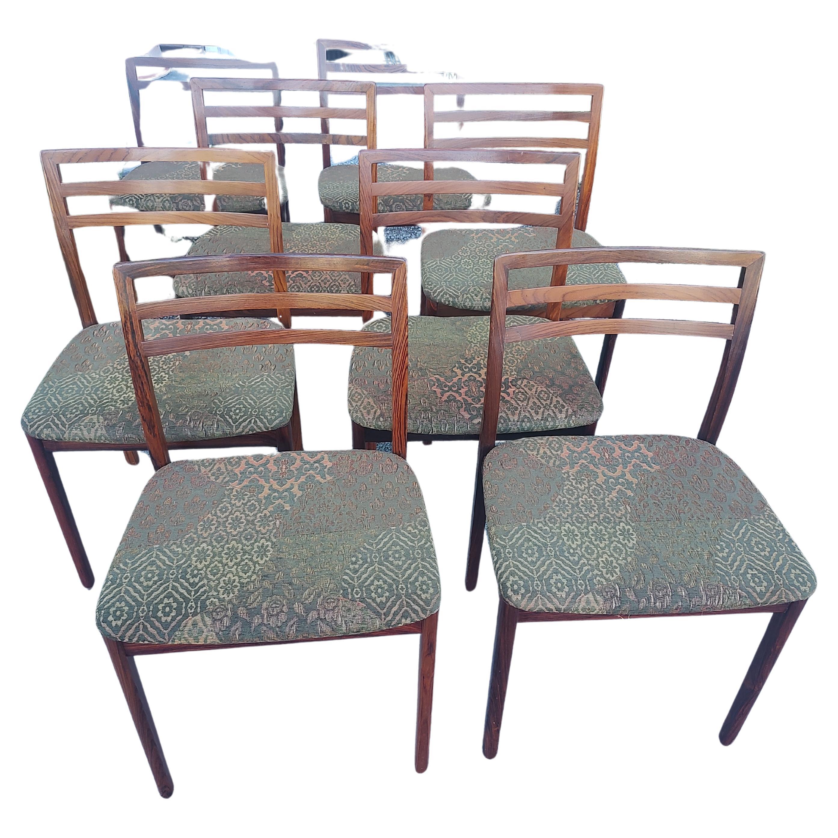 Eight Mid Century Danish Rosewood Ladderback Dining Chairs by Niels Moeller For Sale