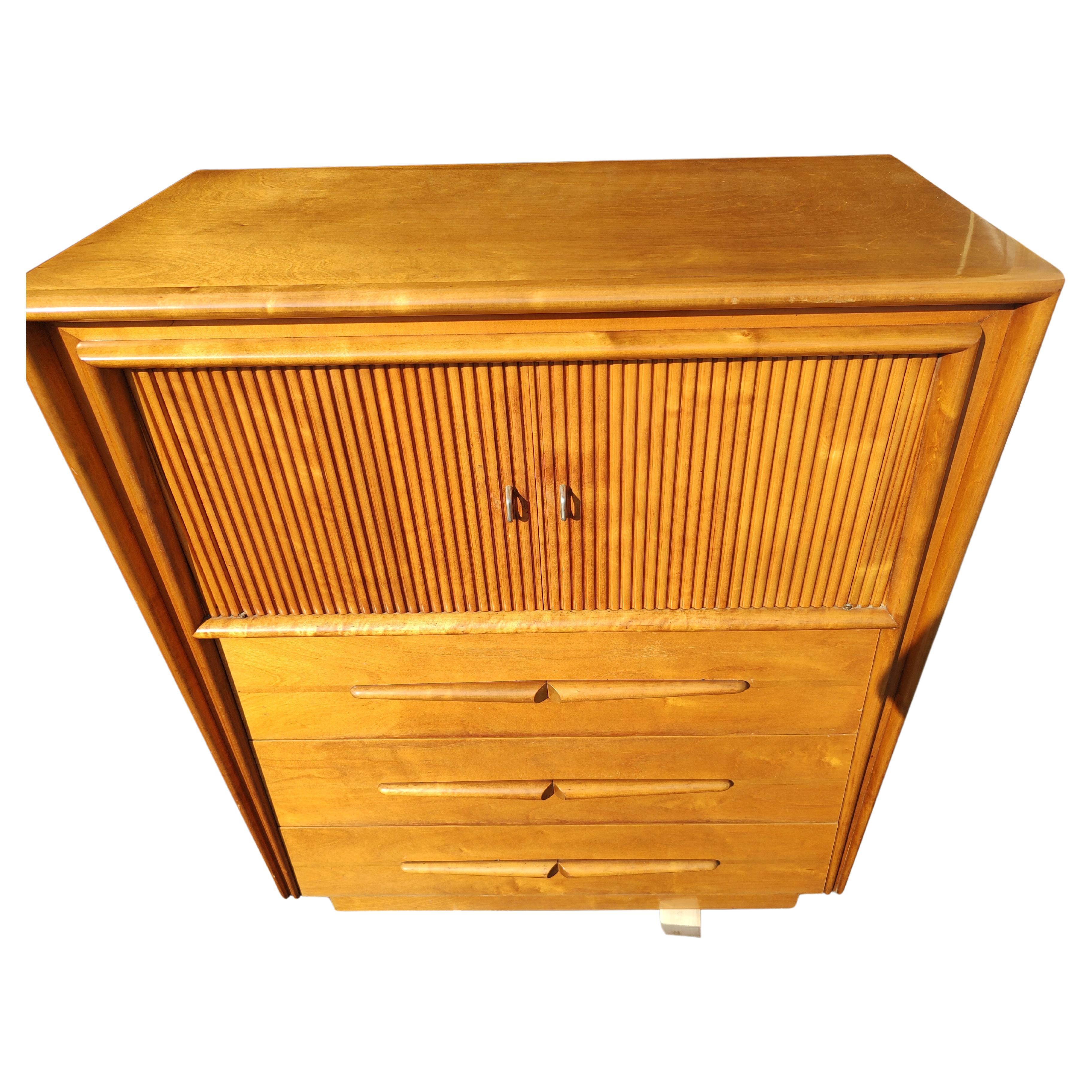 Fantastic simple and elegant 3 drawer dresser with a two door cabinet above. Have the original paperwork from its sale, original and only owners. In excellent vintage condition with minimal wear, original finish with a little tuneup. Drawers glide