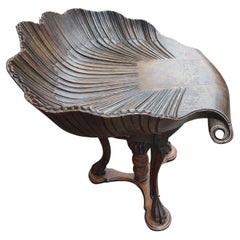 Vintage Neoclassical Carved Walnut Grotto Shell Stool Swivels