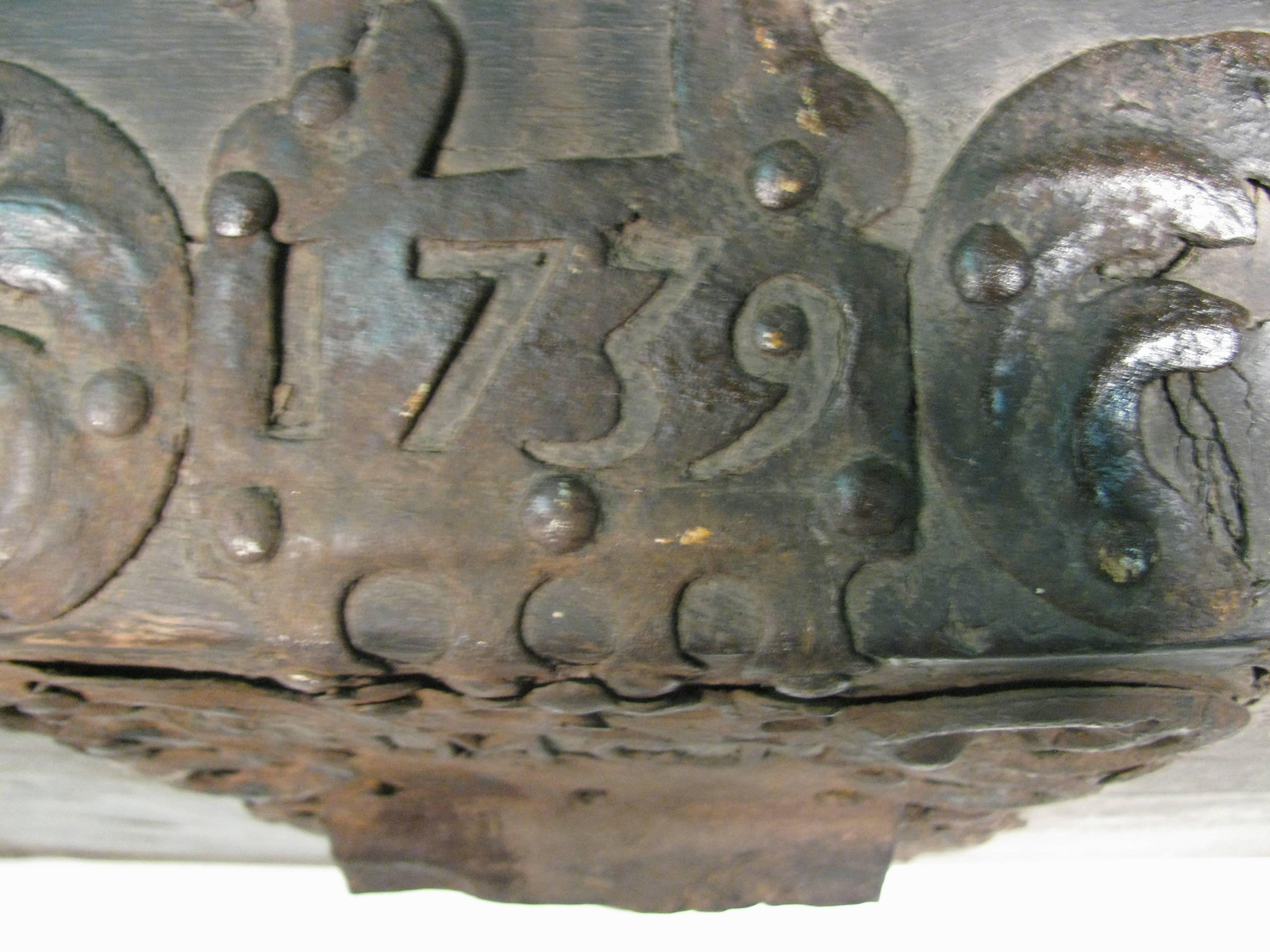 Amazing seafaring trunk, dated 1739. Almost 300 years old and still has retained most of its originality, including the insert shelf. Iron straps and corners both decorate and protect the box. Center of the lid, the date, 1739 is prominently