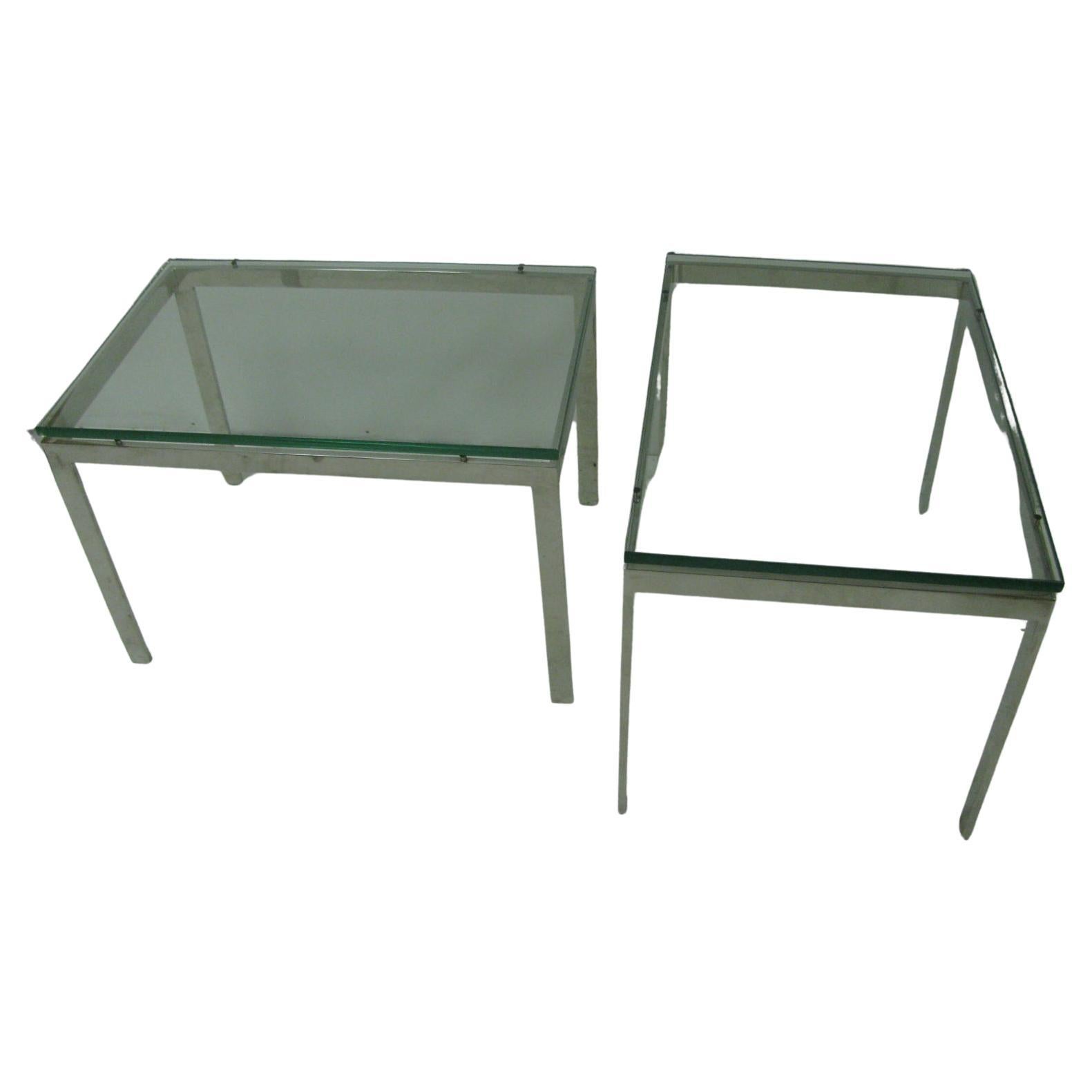 Floating glass rests on four bumpers. Heavy duty flat steel construction plated with nickel chrome. Serious weight to these tables. In excellent vintage condition with minimal wear. Priced and sold as a pair.