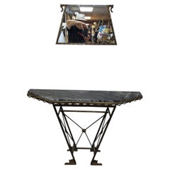 Console Art déco française, fonte et laiton, plateau en granit et miroir, vers 1930