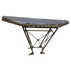 Console Art déco française, fonte et laiton, plateau en granit et miroir, vers 1930