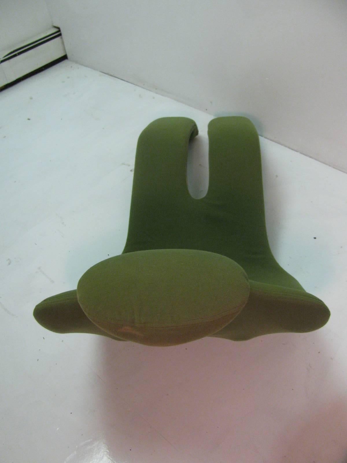 Pair of lounge chairs by Olivier Mourgue in green fabric.
