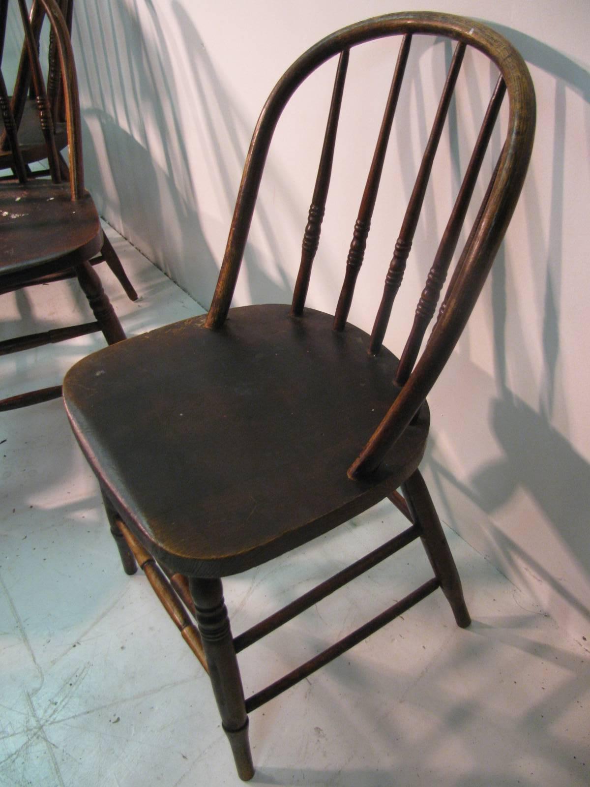 Early 20th Century Classic Set of Ten Primitive Windsor Bow Back Chairs