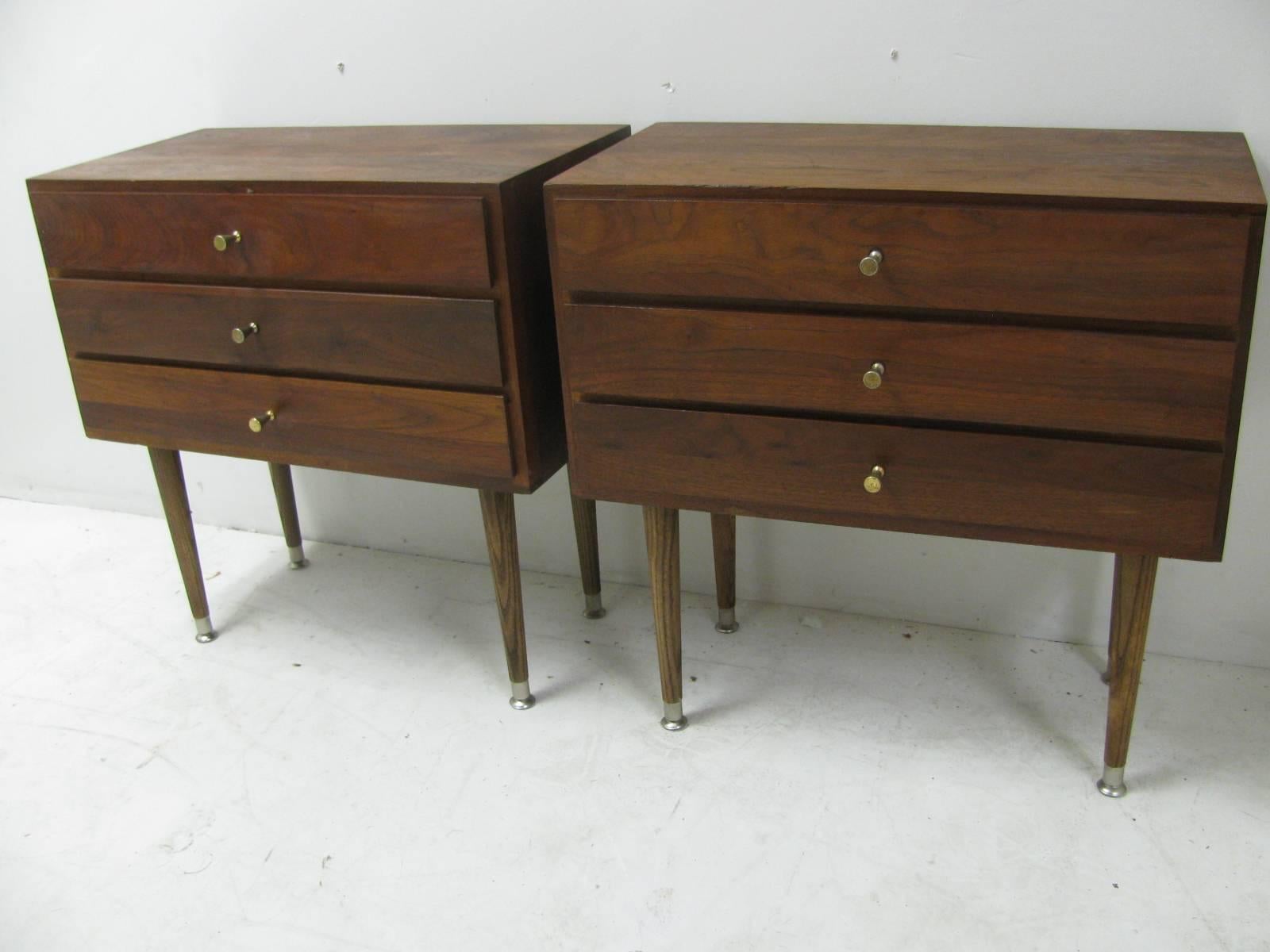 Fabulous pair of Walnut three drawer night tables with nickel pulls. Simple and elegant square lines, with solid walnut. Suitable for the living area as well as the bedroom.