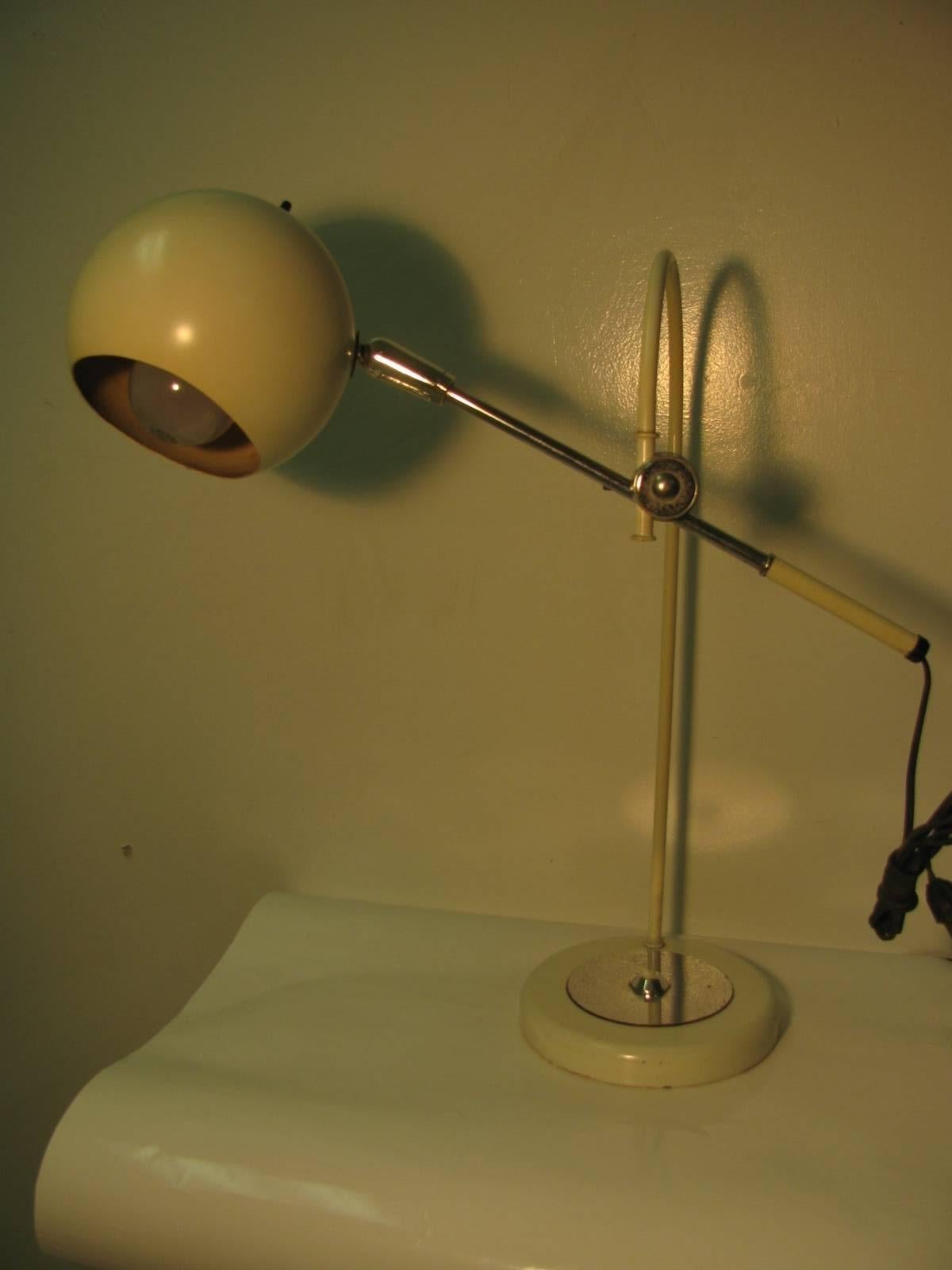Simple elegant and iconic describes this lamp by Richard Sonneman. White with chrome accents. All original. Dimensions are listed, but the lamp has many positions to use.