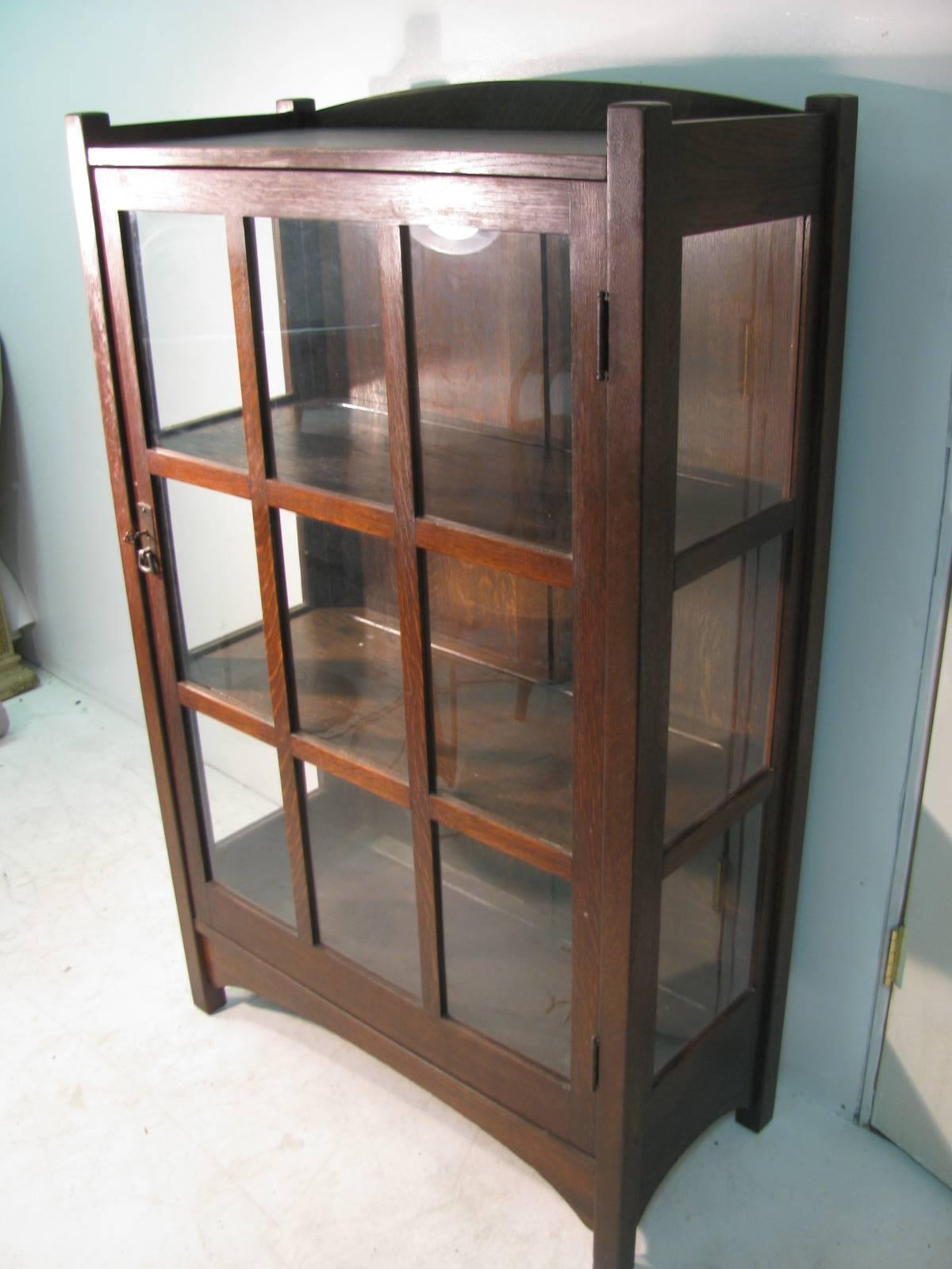Beautiful handcrafted China, closet by the Stickley Bros., Leopold and John George. Great size with three fixed shelves. Divided panes of glass are all original along with finish of the quarter sawn oak. Cabinet is unsigned but guaranteed to be