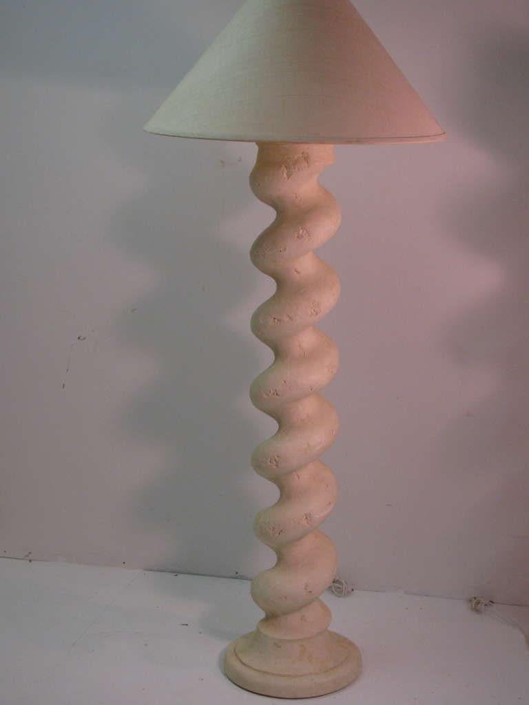 Beautiful and with a presence. Typical of a Michael Taylor design. Postmodern oversized pair of plaster spiral column lamps have wide girth to go with the height. Nearly six feet tall and over nine inches wide. Well constructed and designed,