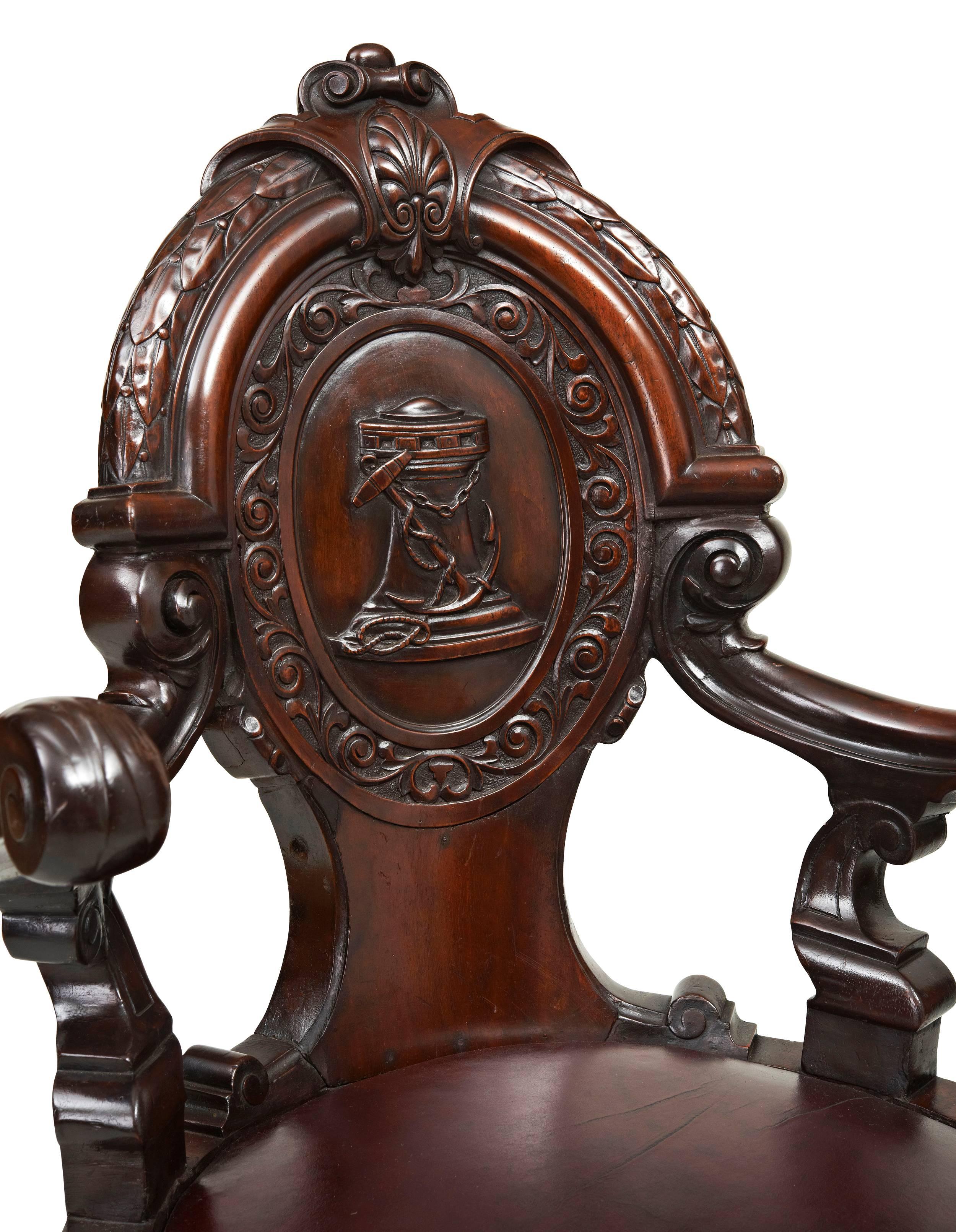 The quality of this mahogany Ship’s Chair is exceptional and it stands out from many that you see. It has strong carving with acanthus leaves to the arms, rope twists to the seat edge and leg columns. The carving to the oval back is of a fouled