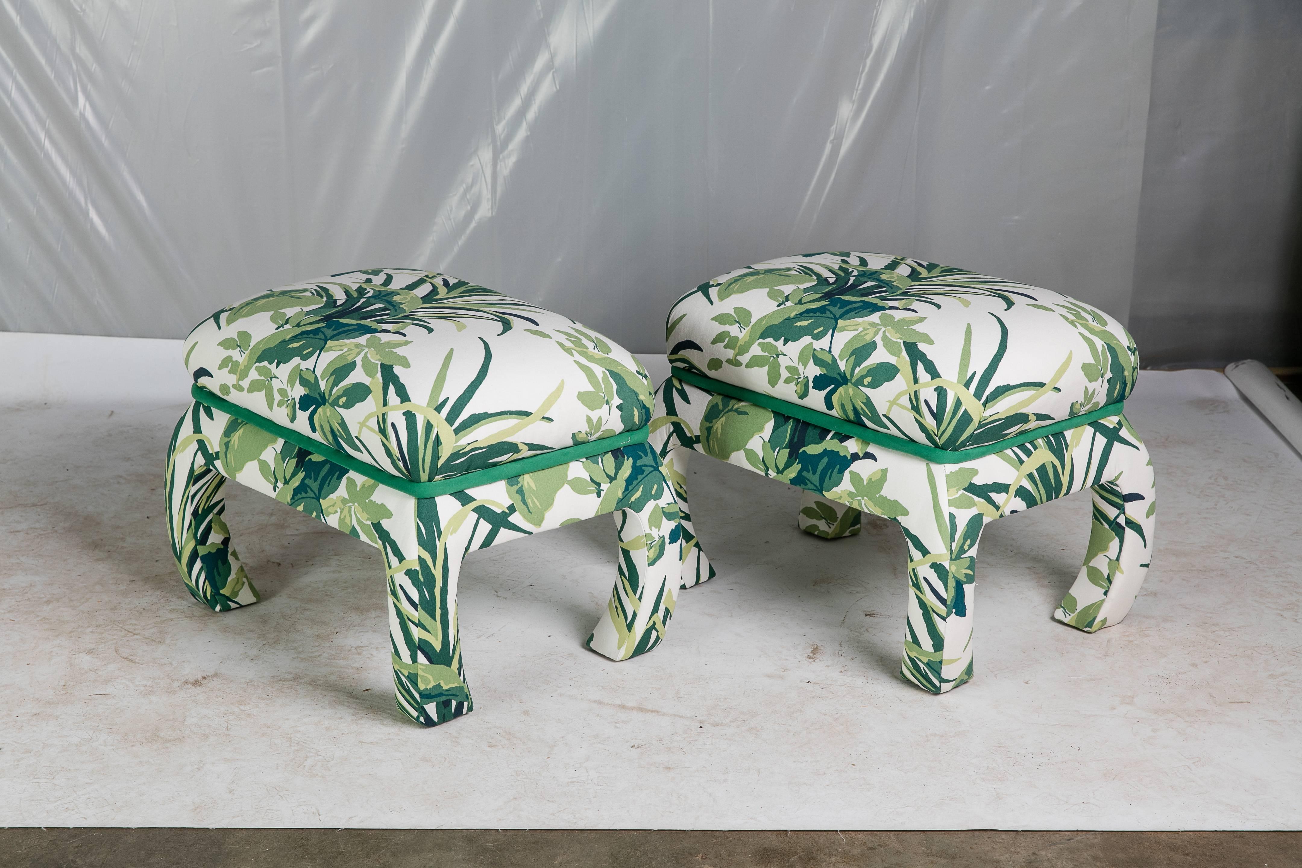 A pair of vintage 1980s fully upholstered bench-style ottomans from Century Furniture. The ottomans have been newly upholstered in Madcap Cottage for Robert Allen Bermuda Bay cotton fabric.