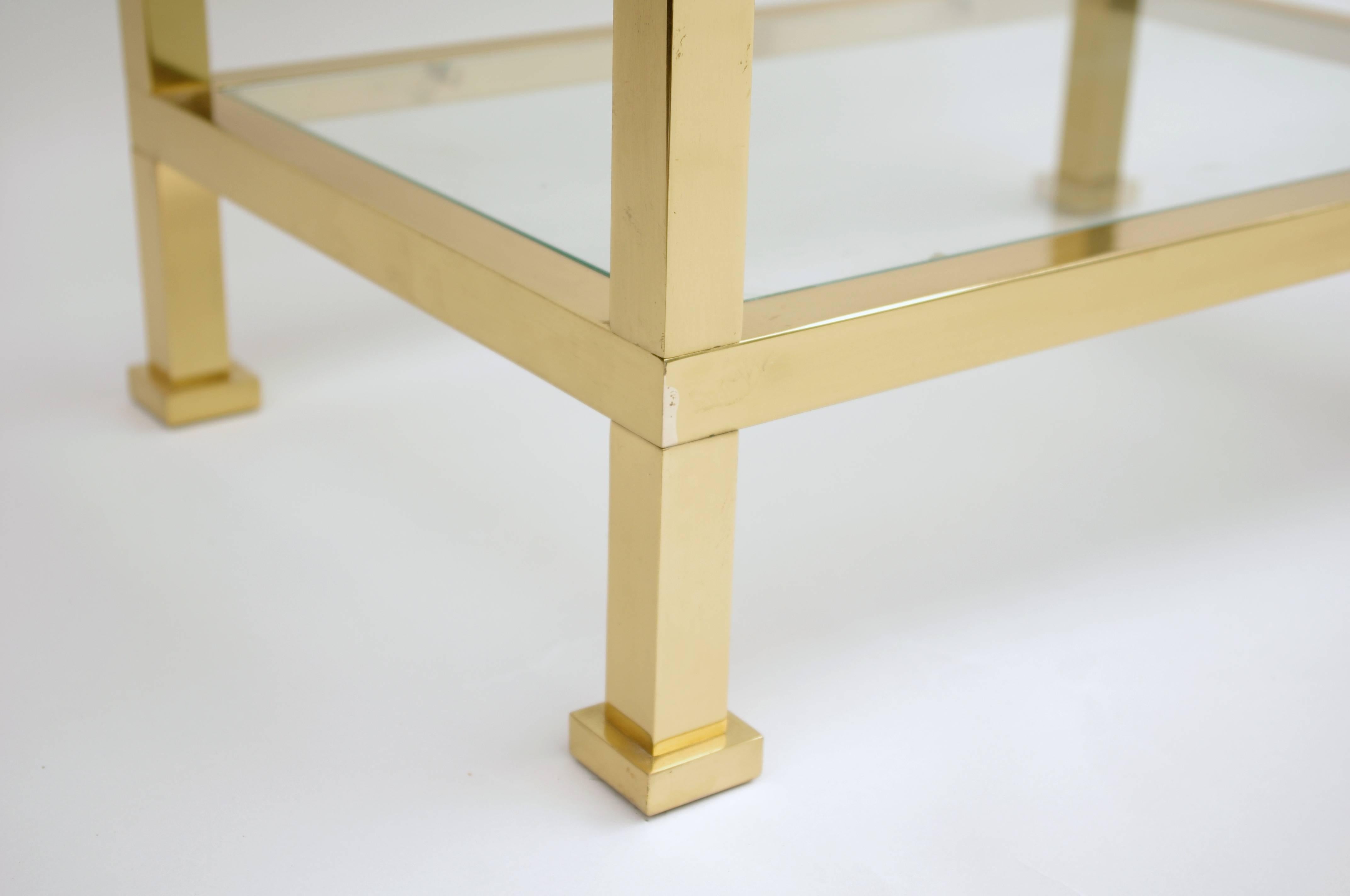 Gilt bronze side table with three glass trays in the style of Guy Lefèvre for the Maison Jansen.

Work from the 1970’s.