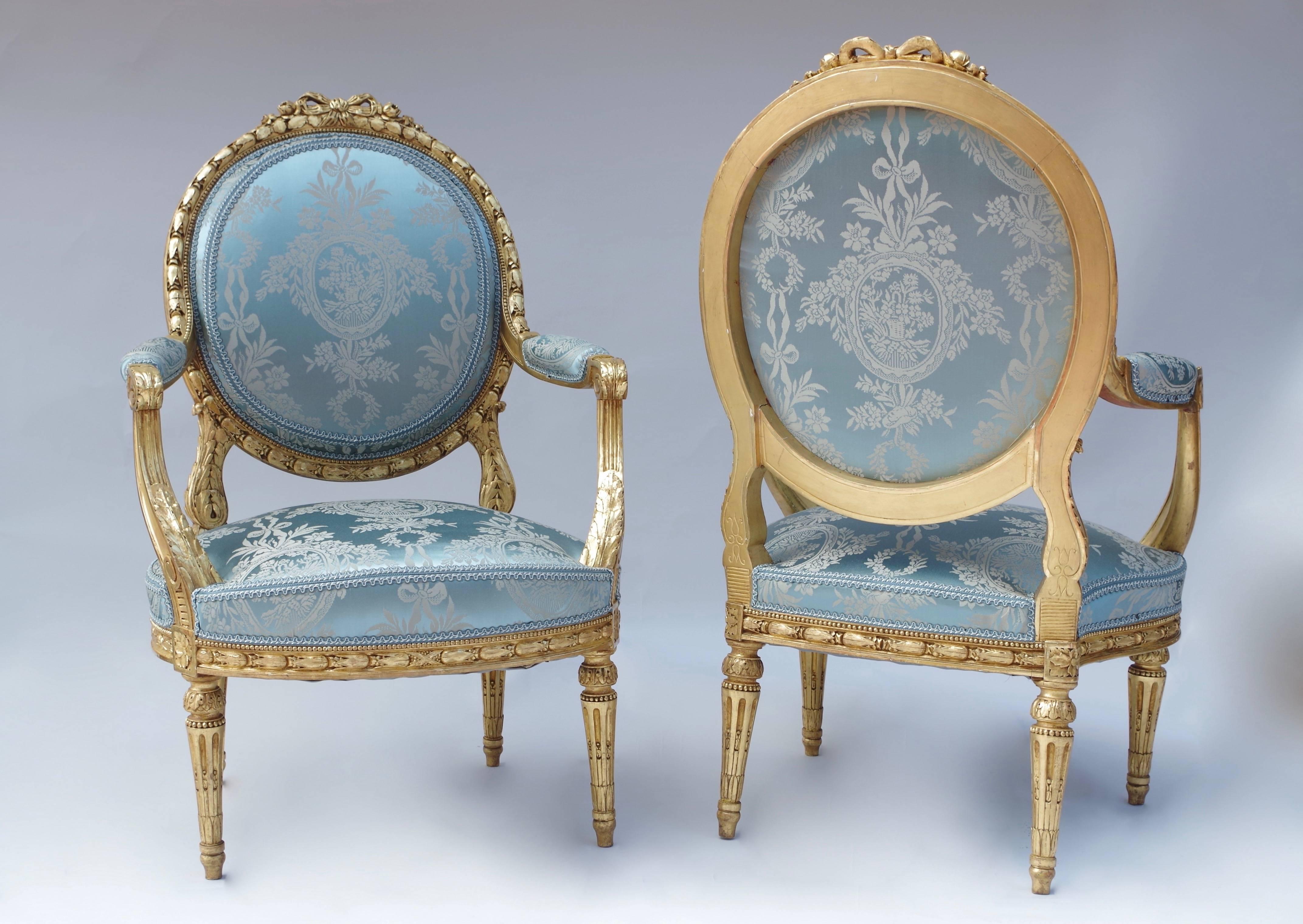 French Pair of Louis XVI Style Giltwood Armchairs, Medallion Shape Backrest, circa 1880