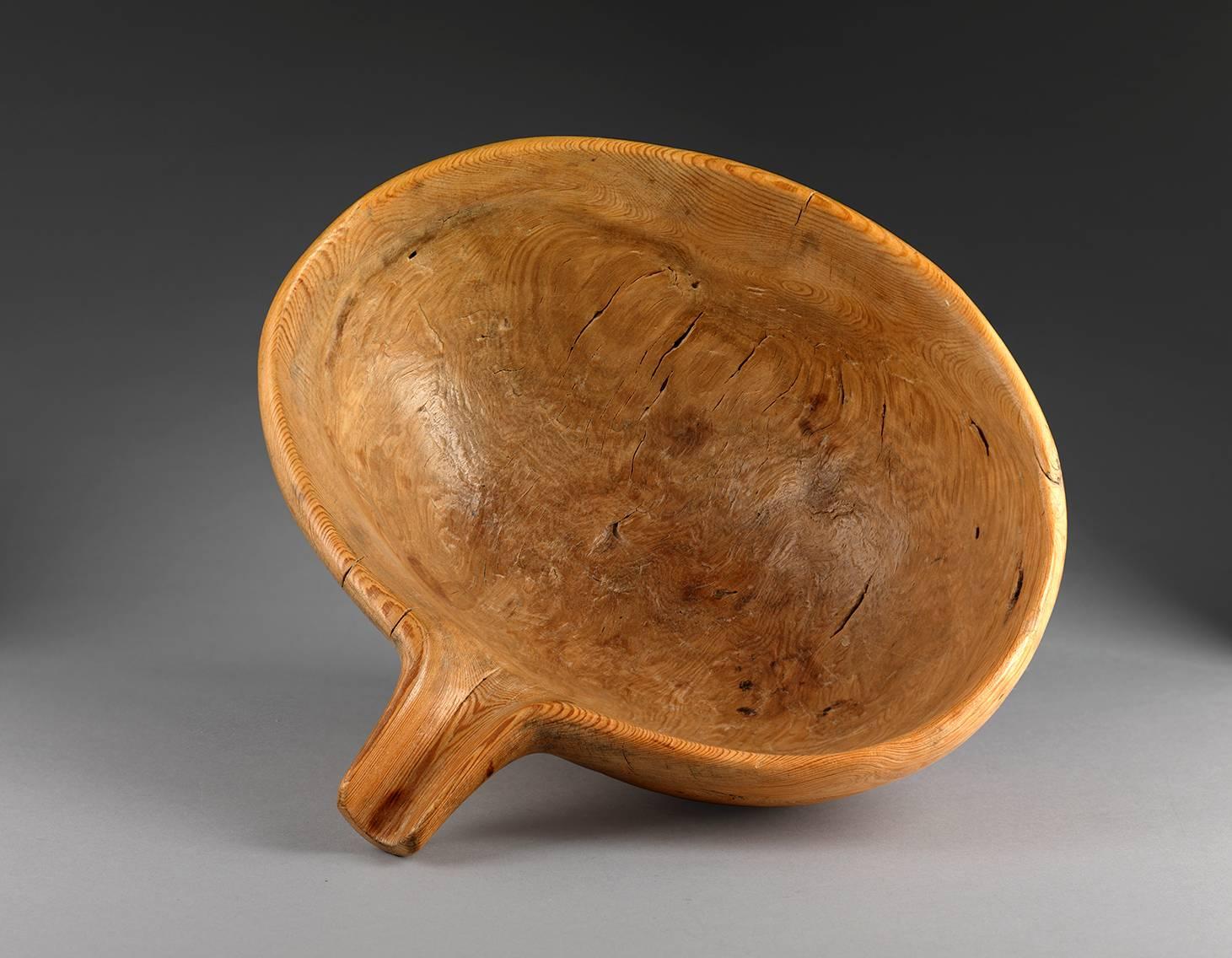 Of naturalistic form
dug out and hand-carved pine.
Carved to underside 